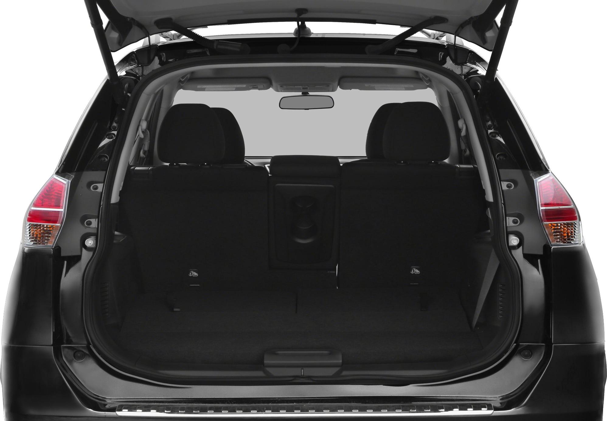 Open trunk showing rear cargo space and rear seats from inside a vehicle