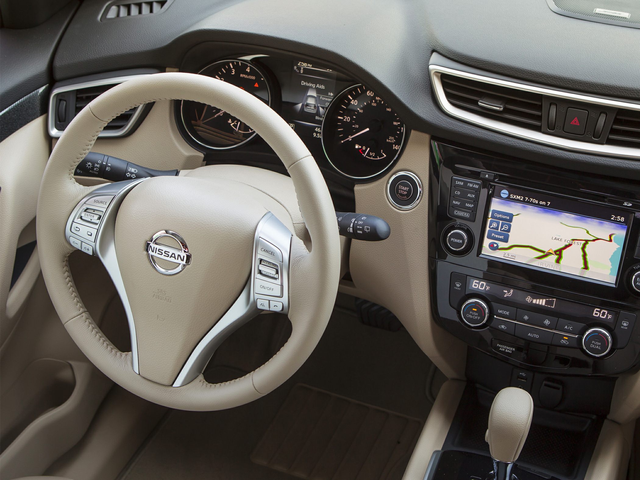 Leather steering wheel, analog gauges, touchscreen navigation, dual climate control