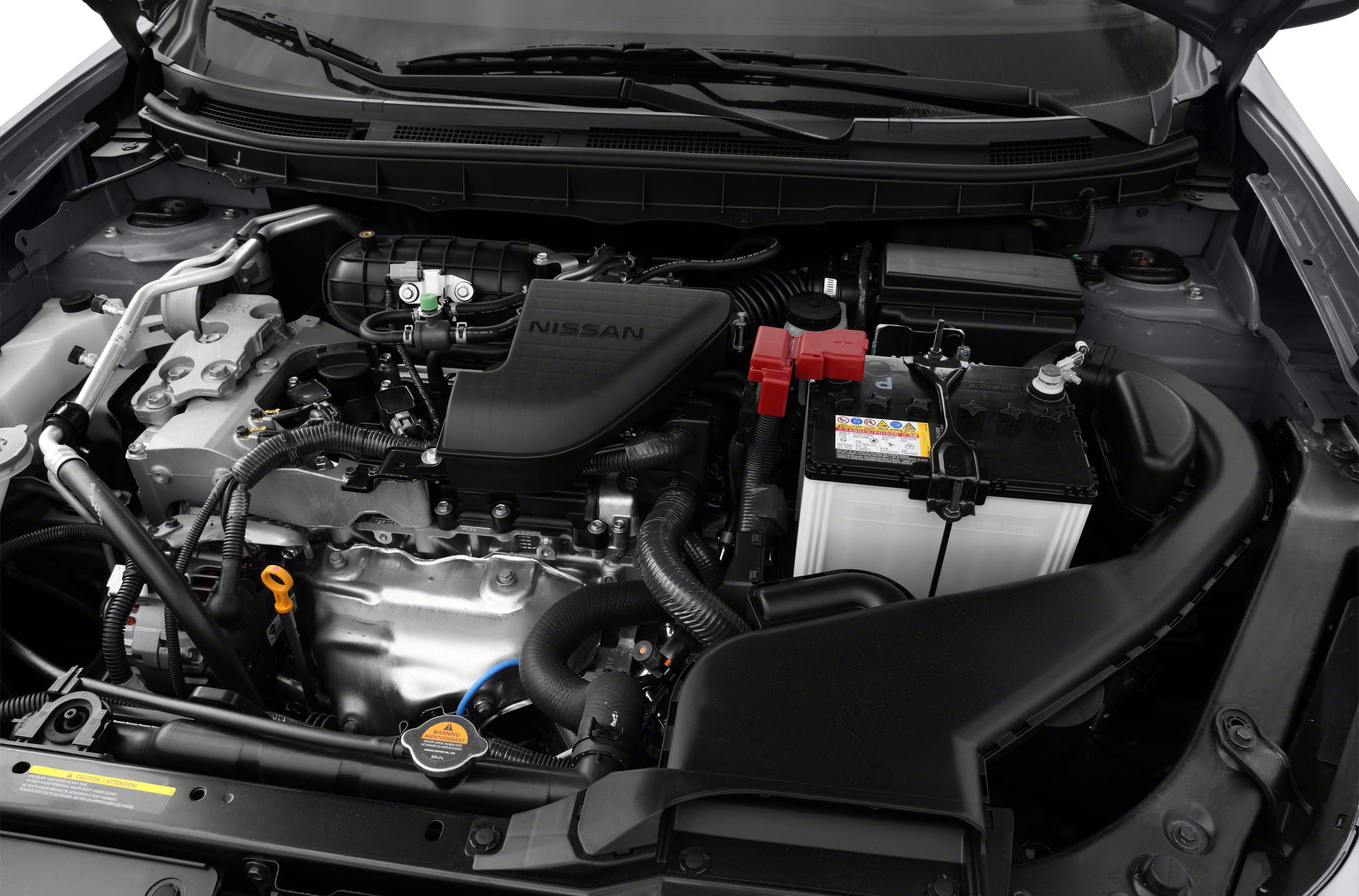 Engine bay with engine and battery in Nissan SUV