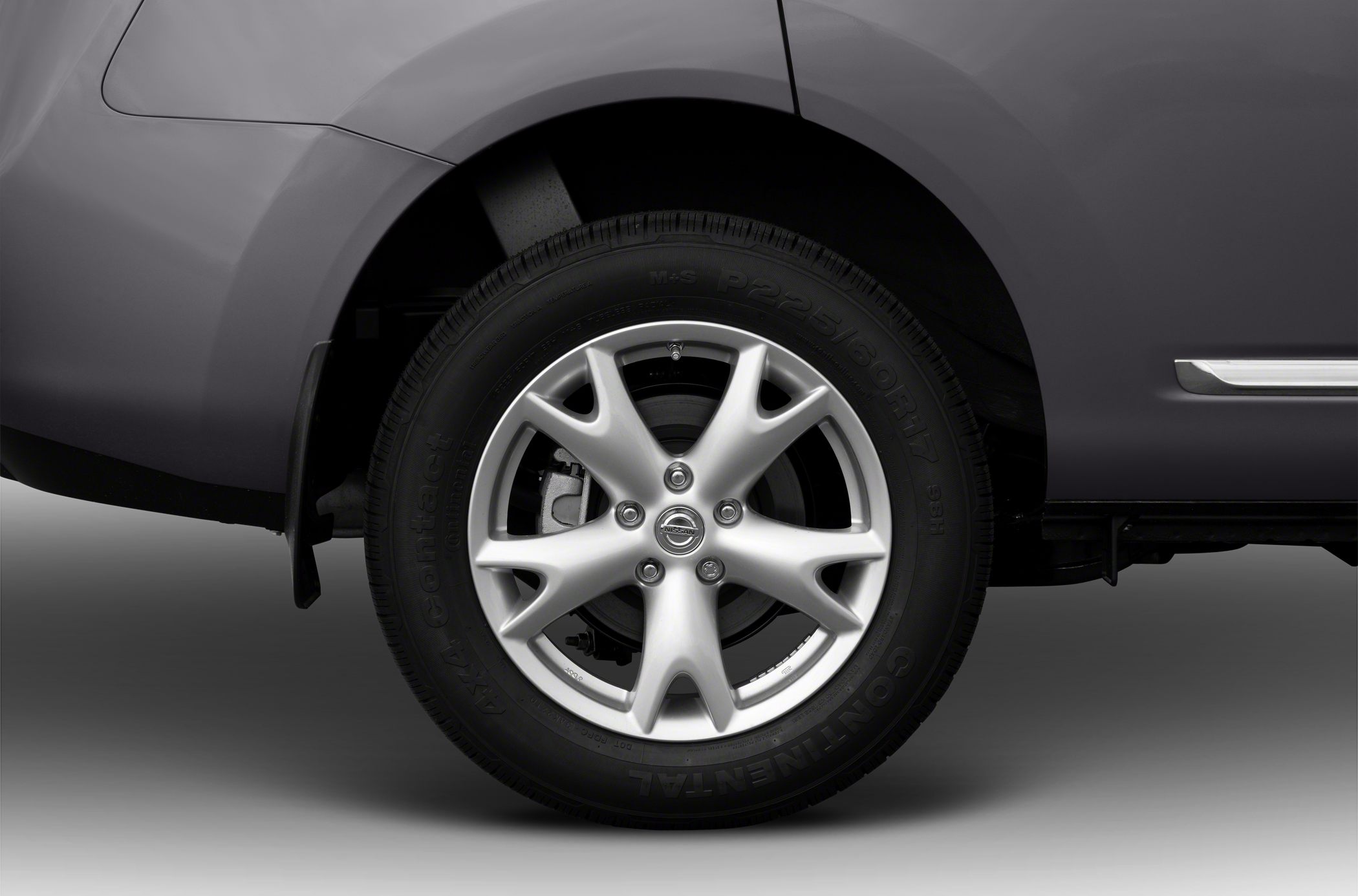 Close-up of alloy wheel and tire on SUV rear side