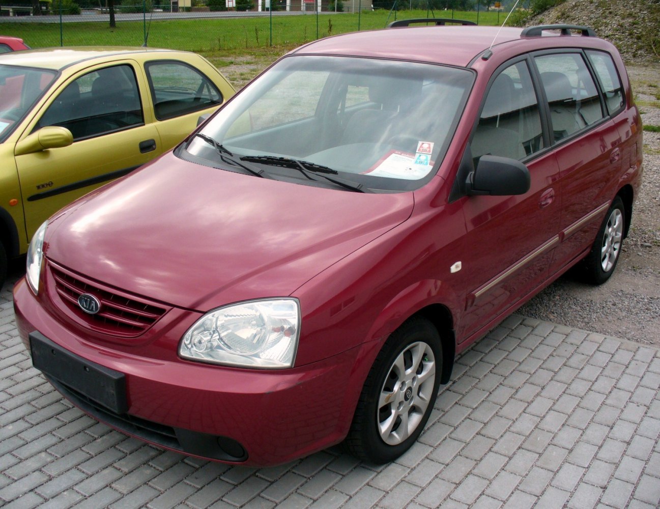 Red wagon with roof rails and alloy wheels