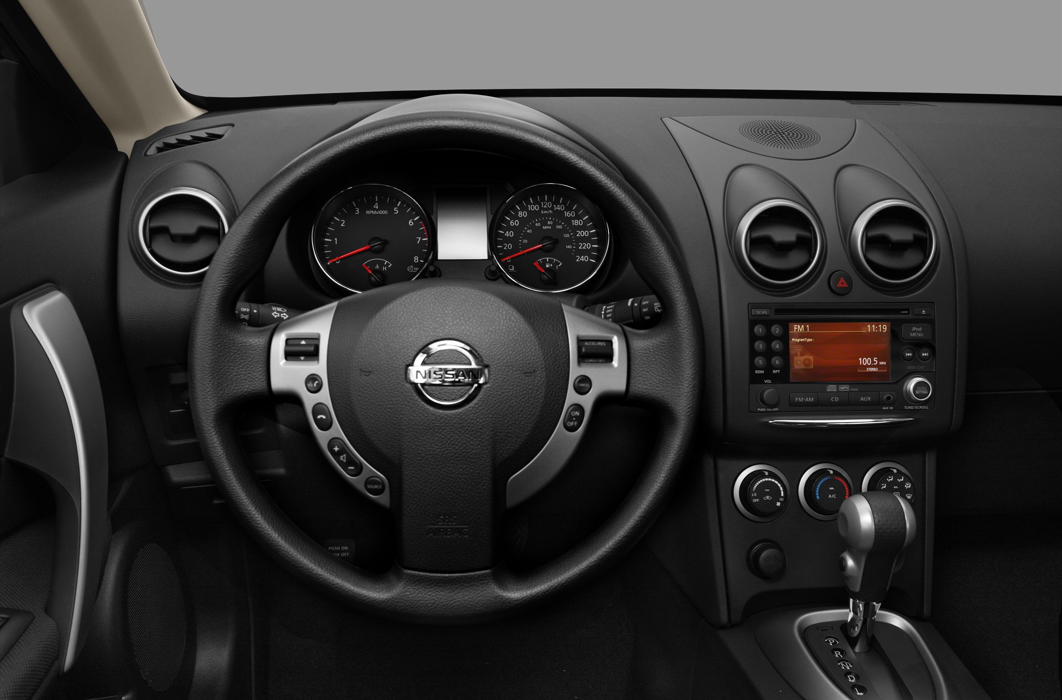 Steering wheel, dashboard with speedometer and radio display