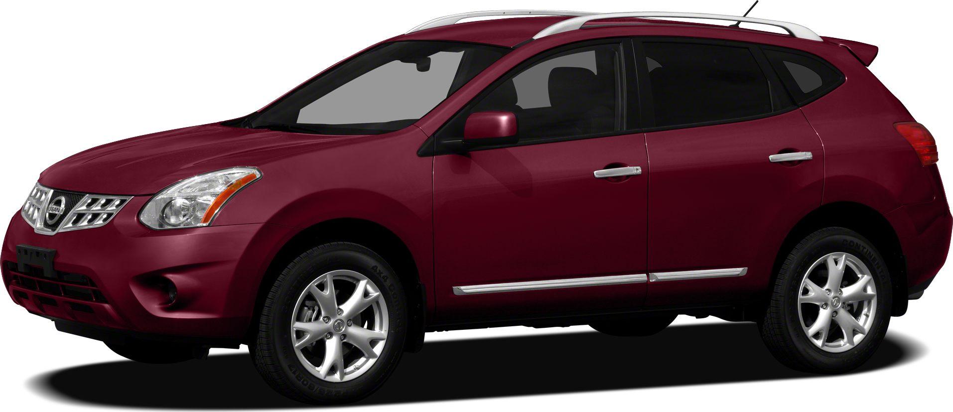 Red compact SUV side profile with alloy wheels and roof rails