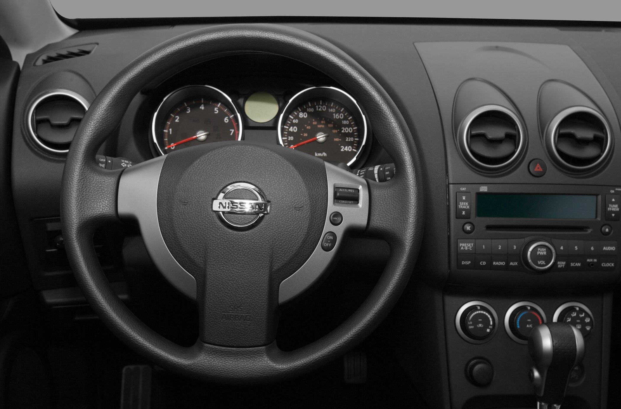 Steering wheel and dashboard with instrument cluster and center controls