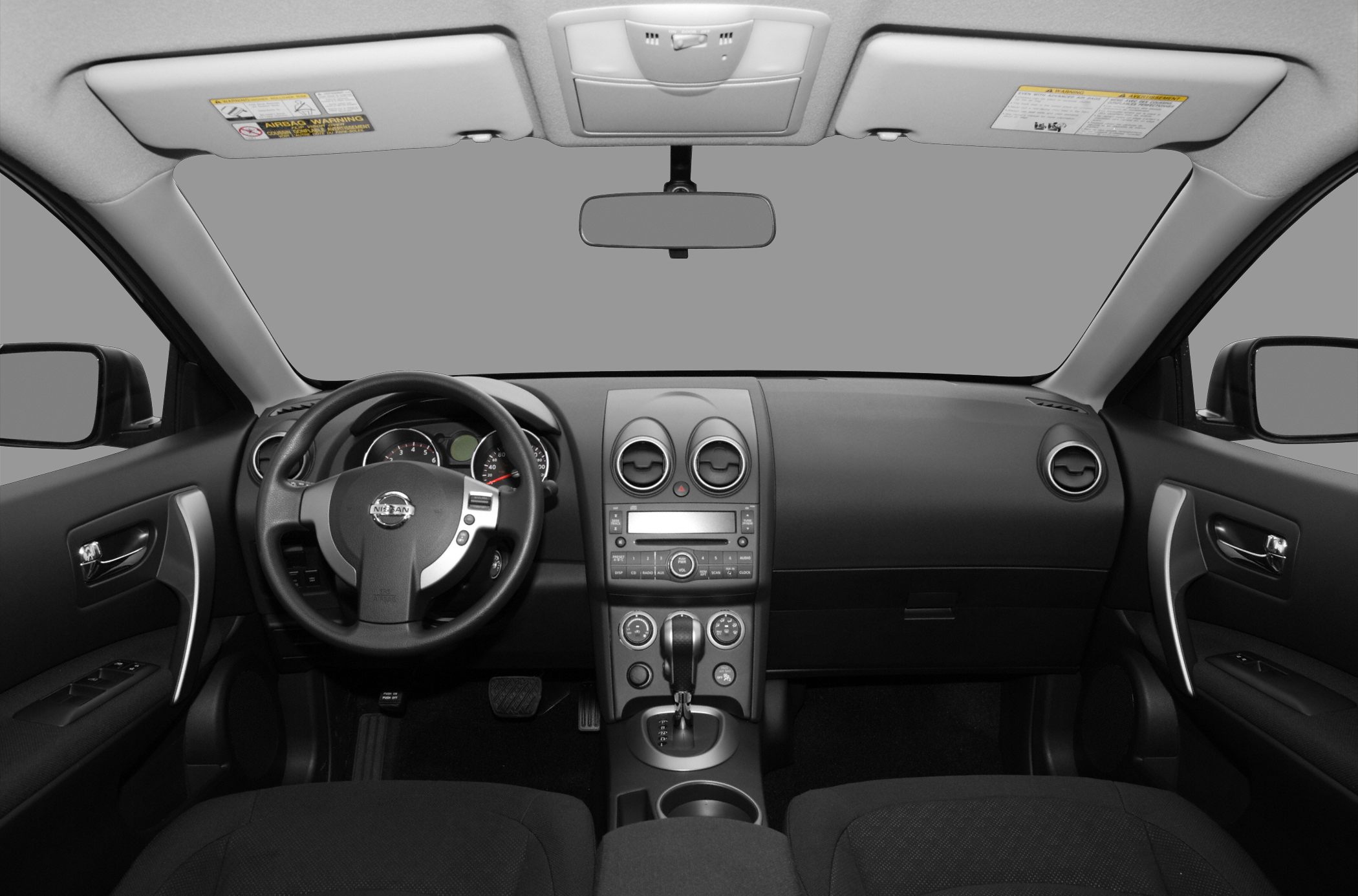 Steering wheel and dashboard with center console and instrument cluster.