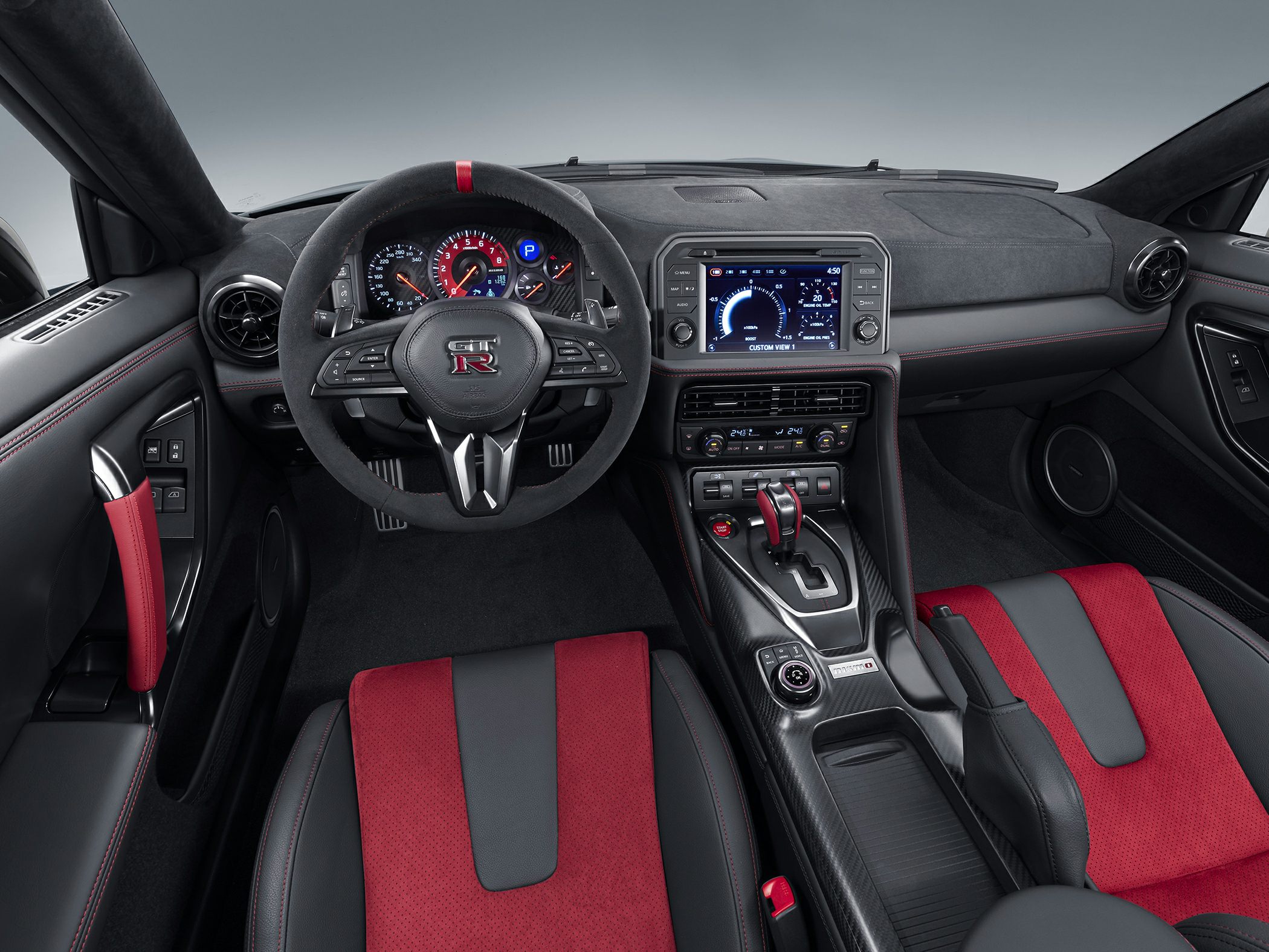 Sporty interior with digital dashboard and carbon fiber center console