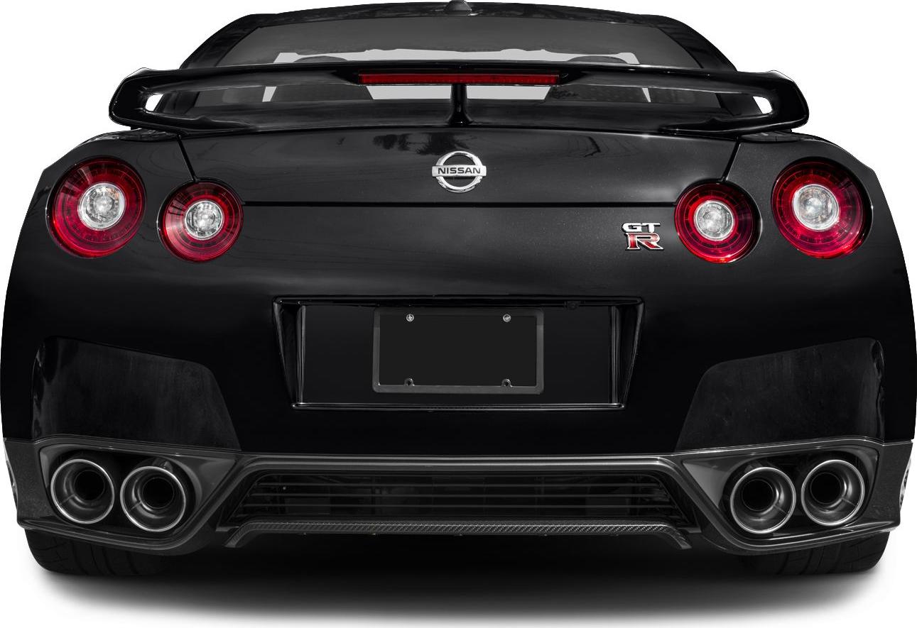 Rear view with quad exhausts, round tail lights, and rear spoiler