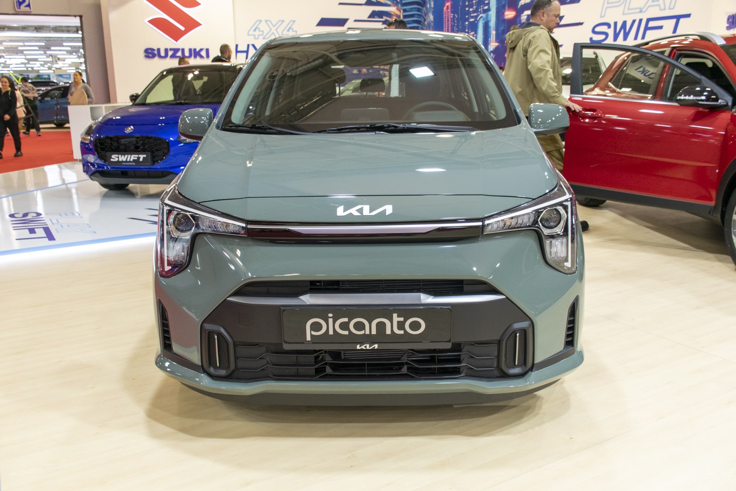 Front view showing updated headlights and grille design in modern compact style