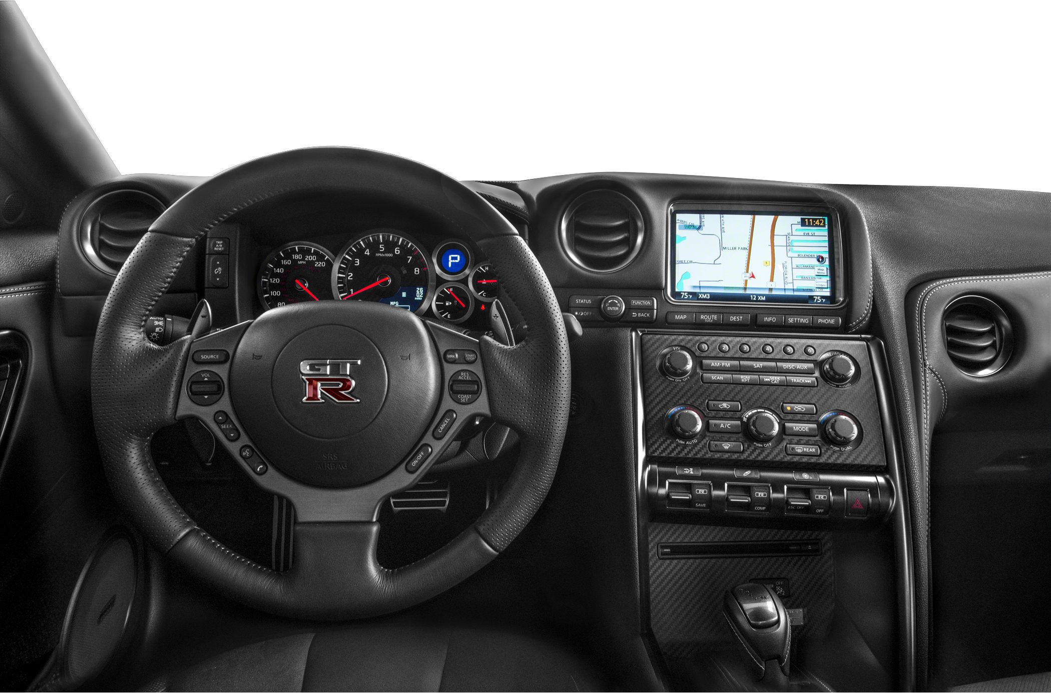 Steering wheel with GT-R emblem and dashboard featuring navigation screen and control buttons
