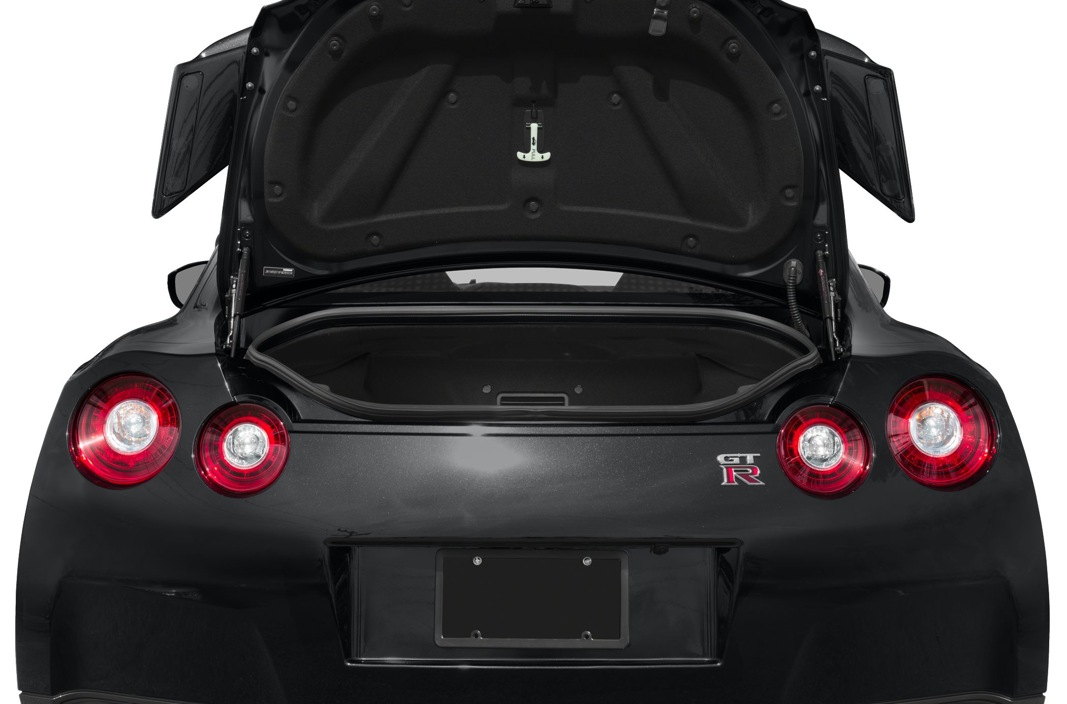 Open rear trunk with iconic round taillights and sporty rear design