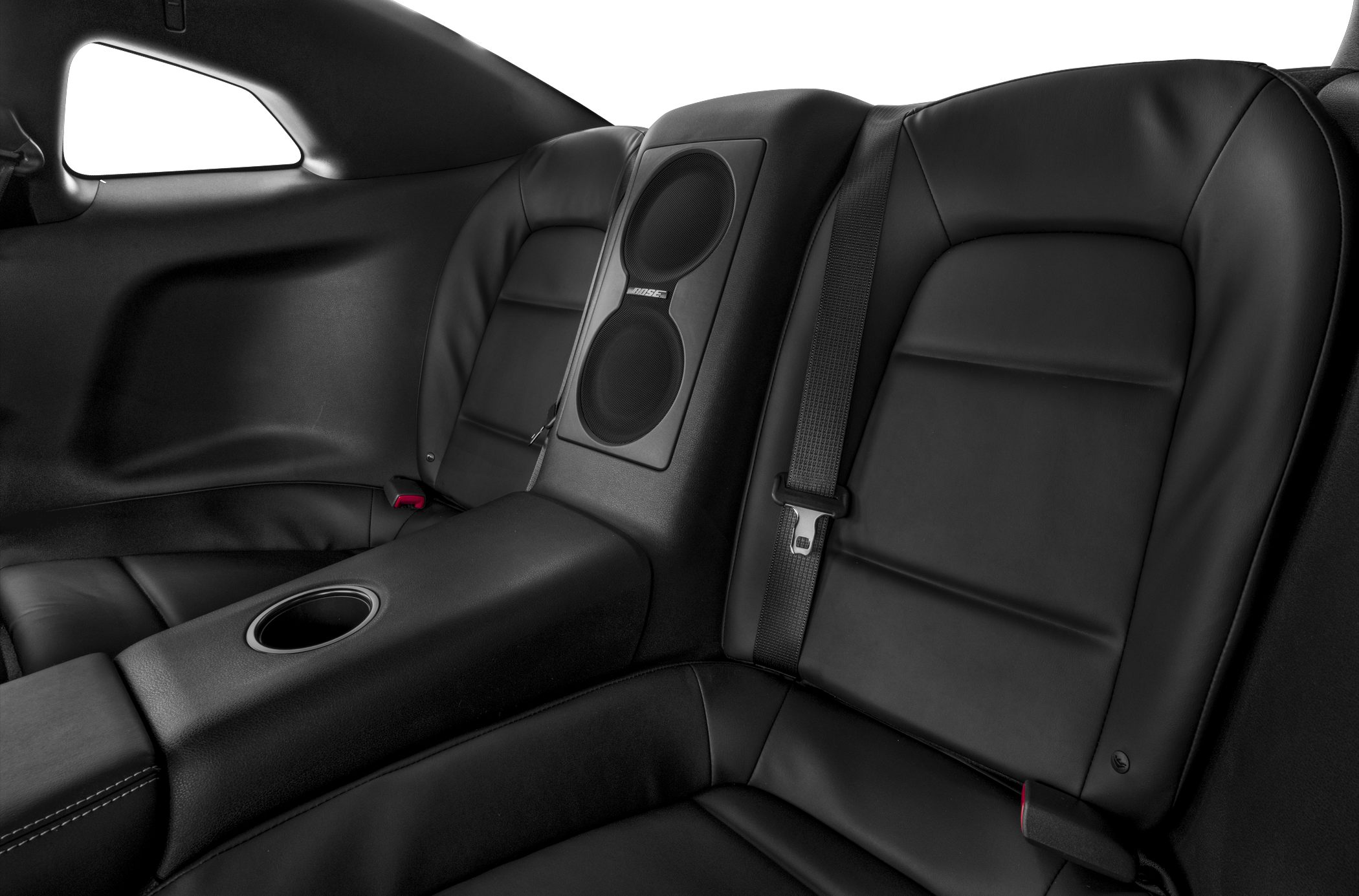 Rear black leather seats with integrated Bose speaker system and cup holder.