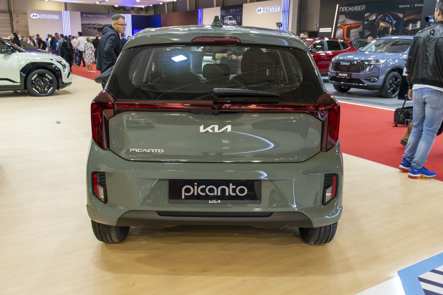 Compact hatchback rear with full-width LED taillights and rear windshield wiper