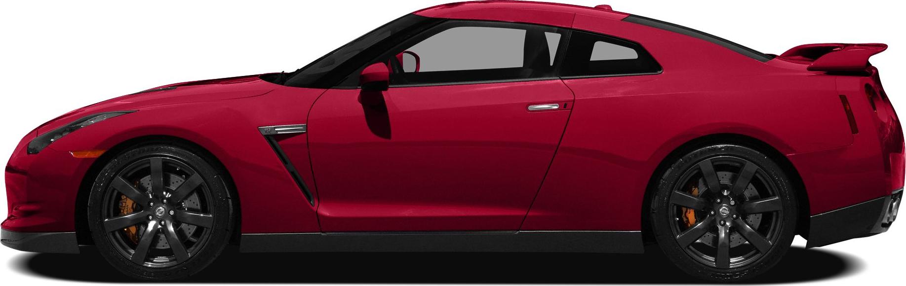 Side profile of a sports coupe with rear spoiler and black alloy wheels