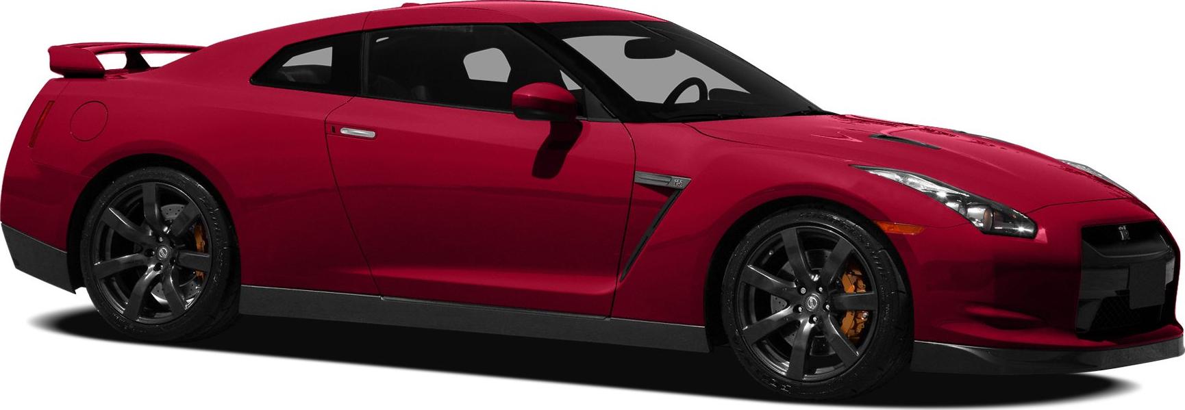 Side profile of a red sports coupe with rear spoiler and front fender vents