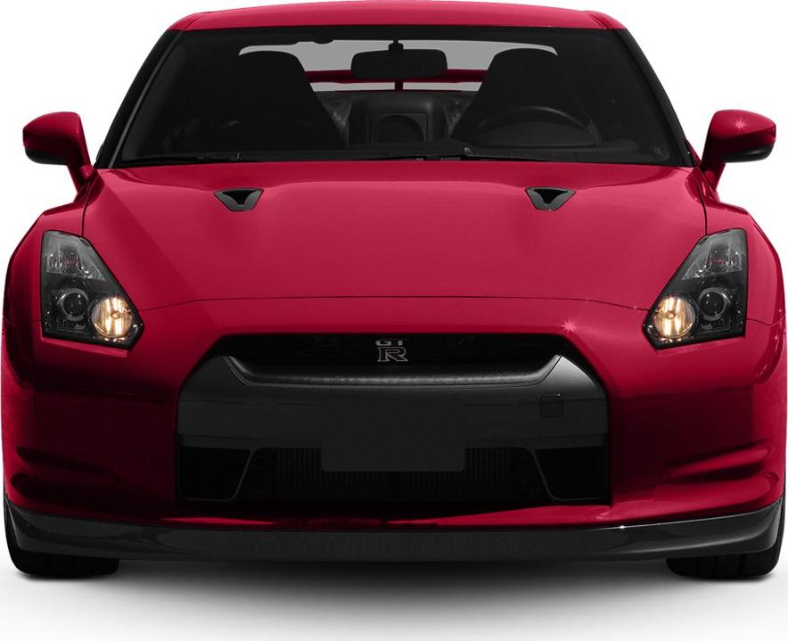 Front view with distinctive headlights and hood vents