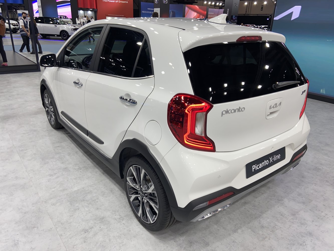 Rear and side view with LED tail lights and modern hatchback design