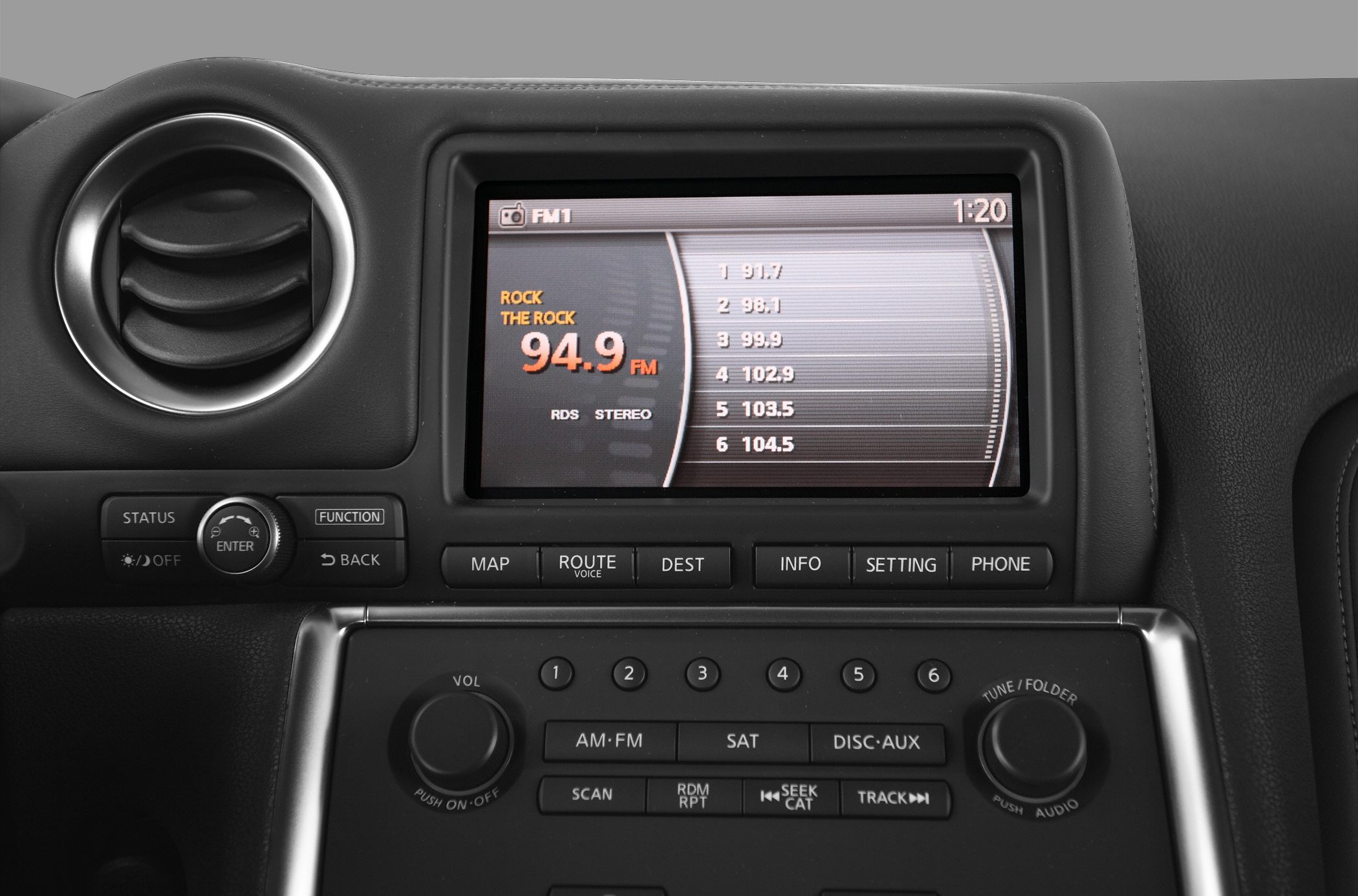 Navigation and audio control panel with FM radio display