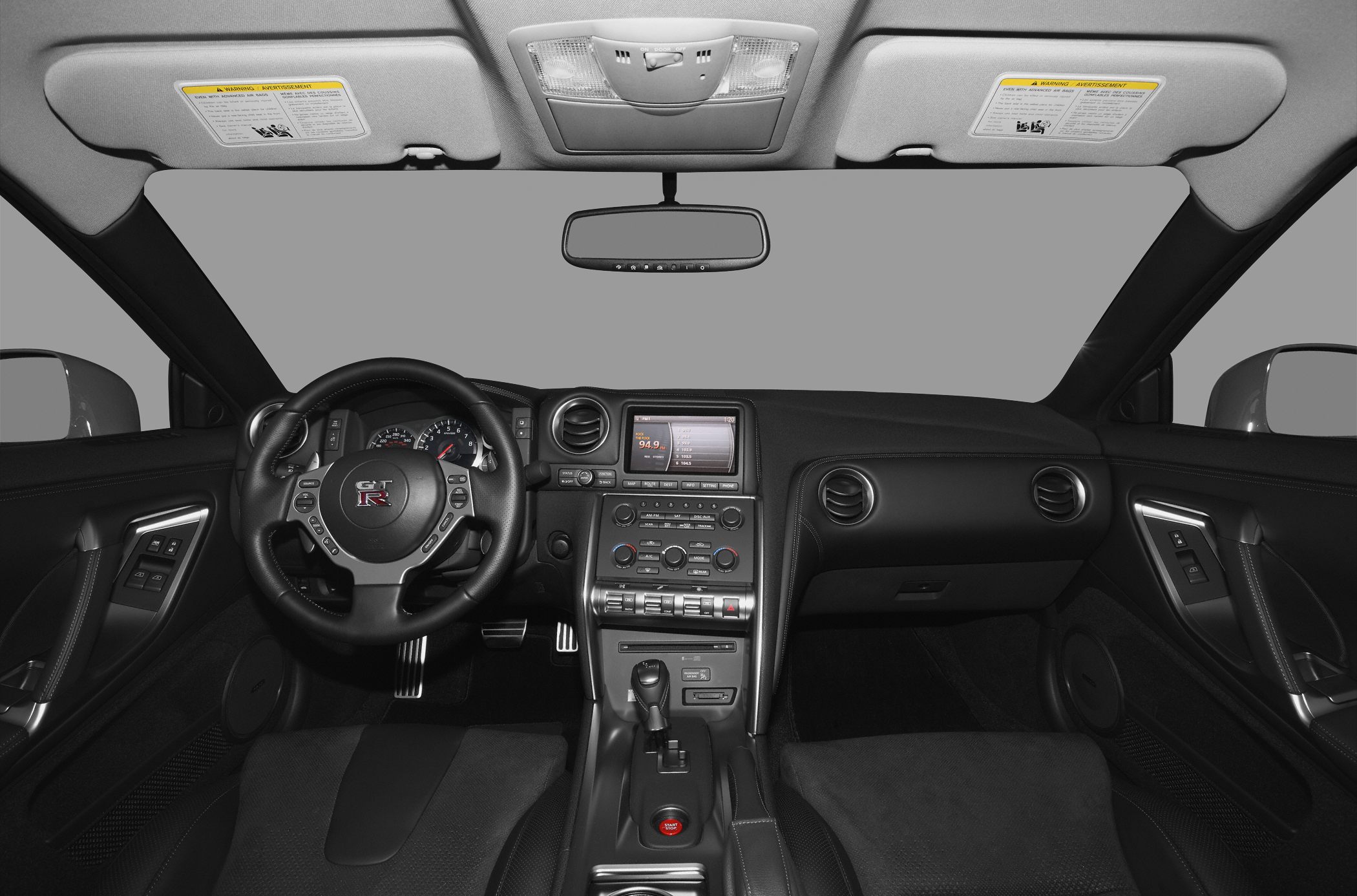 Steering wheel and dashboard with center console and infotainment system