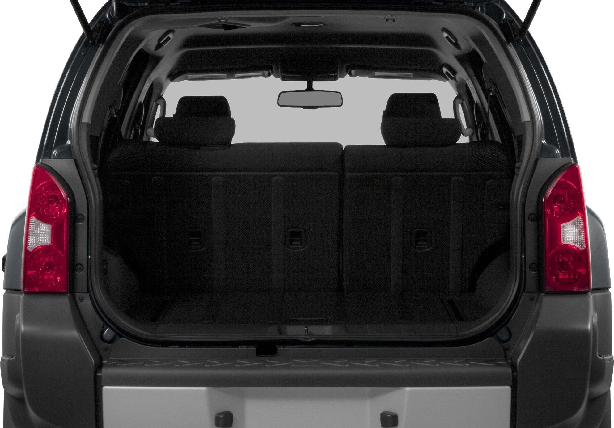 Open rear cargo area with tailgate and rear seats visible