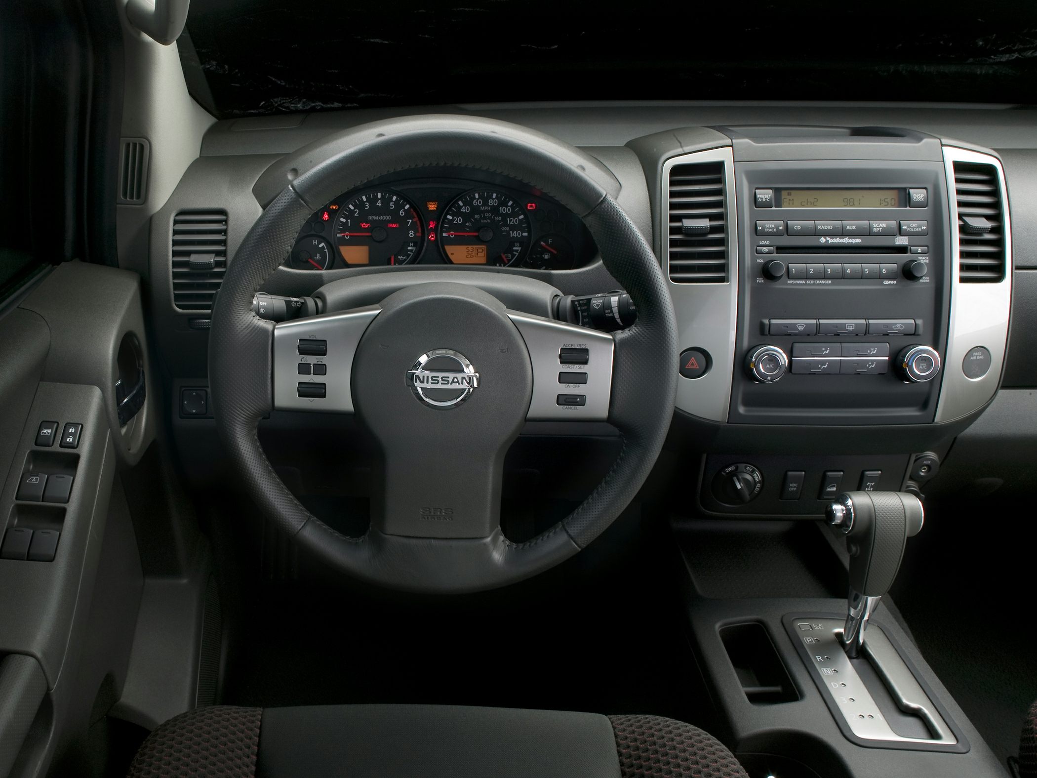 Steering wheel, dashboard, center console with gear shift