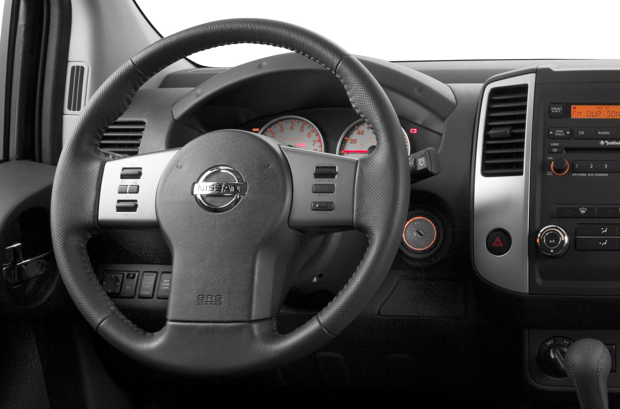 Steering wheel and dashboard interior with controls and 4WD display