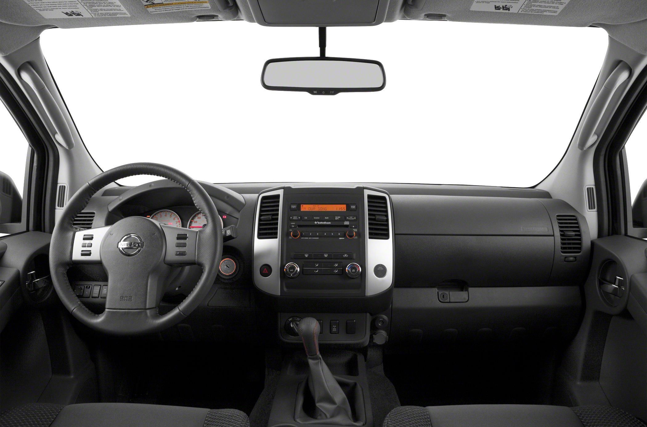 Dashboard, steering wheel, manual gear shift and control panel inside an SUV