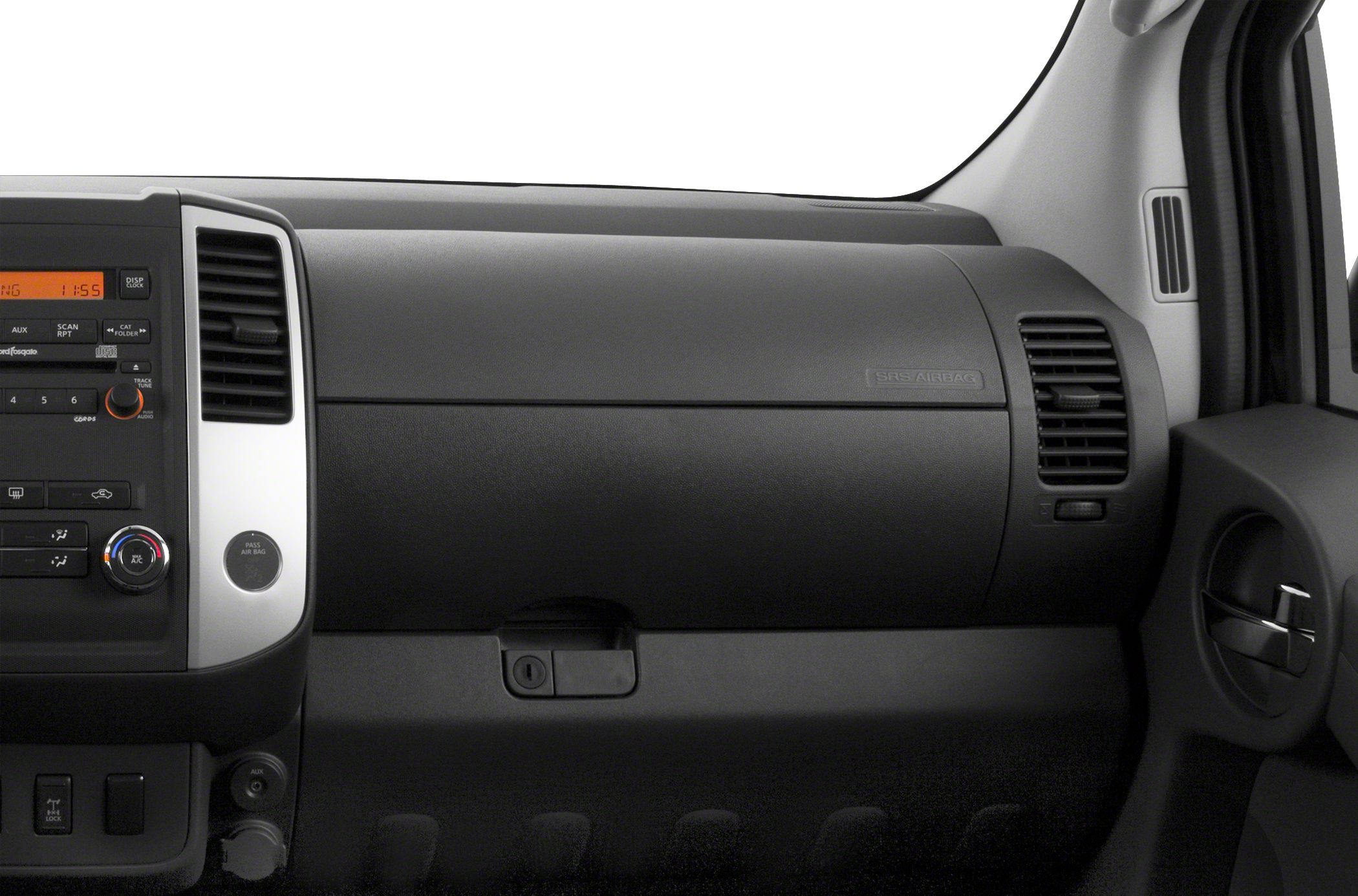 Dashboard with glove compartment, air vents, and control panel.