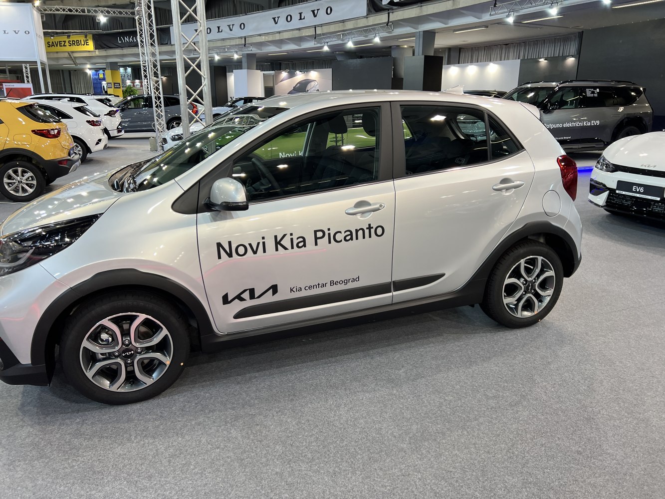 Side profile of a compact hatchback with alloy wheels