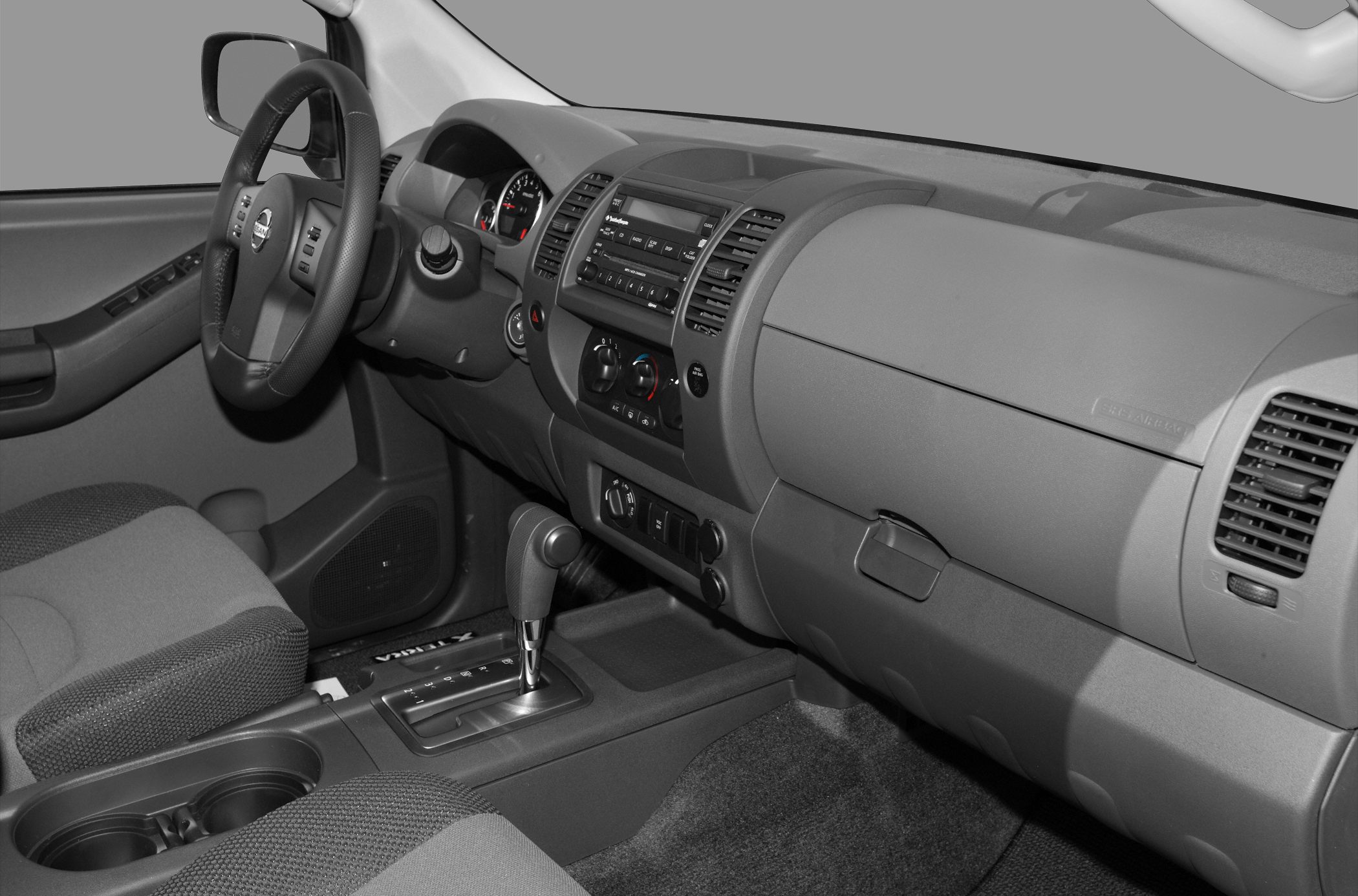 Dashboard, steering wheel, center console with gear shift