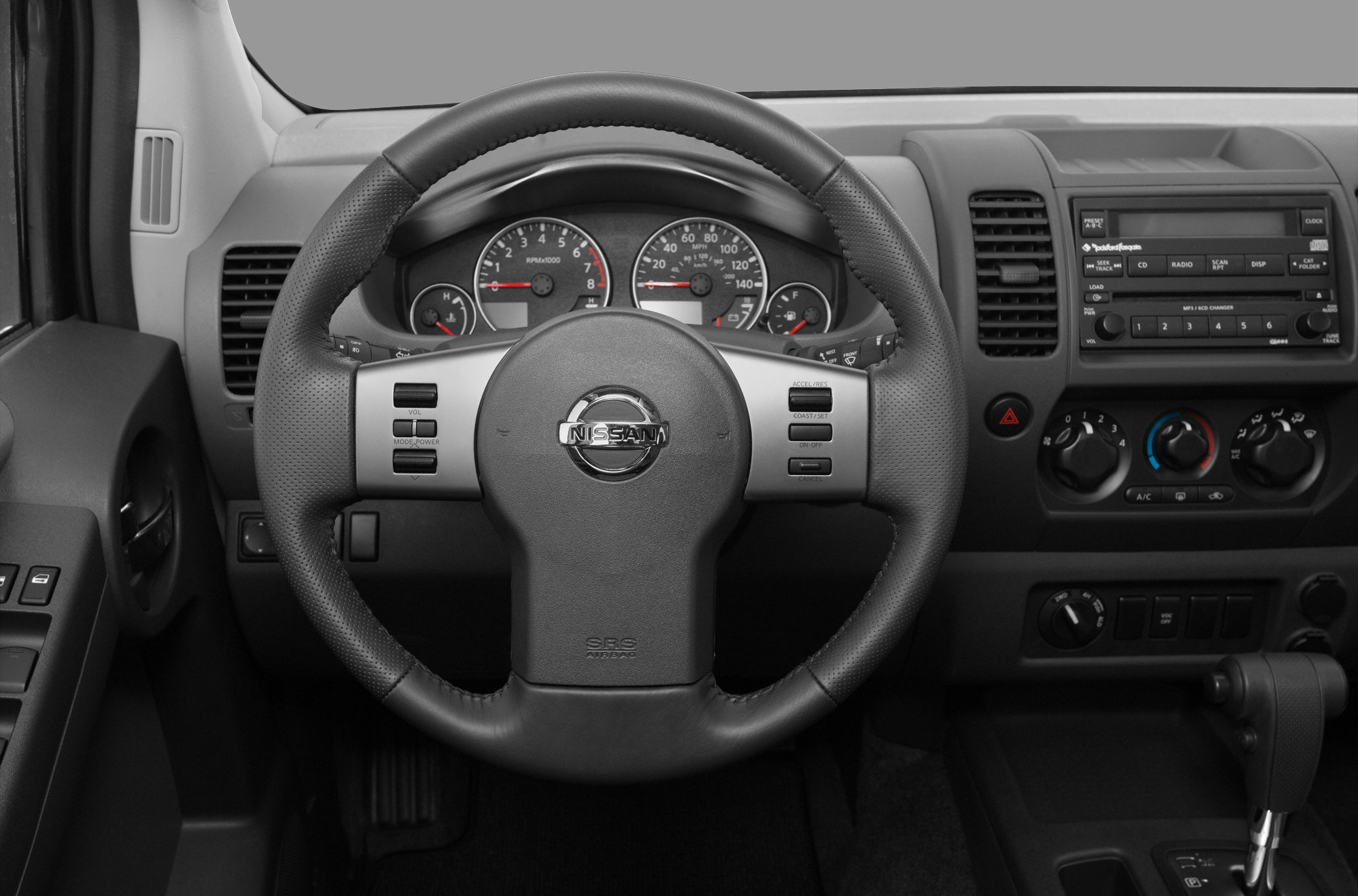 Steering wheel and dashboard controls with instrument cluster and audio system