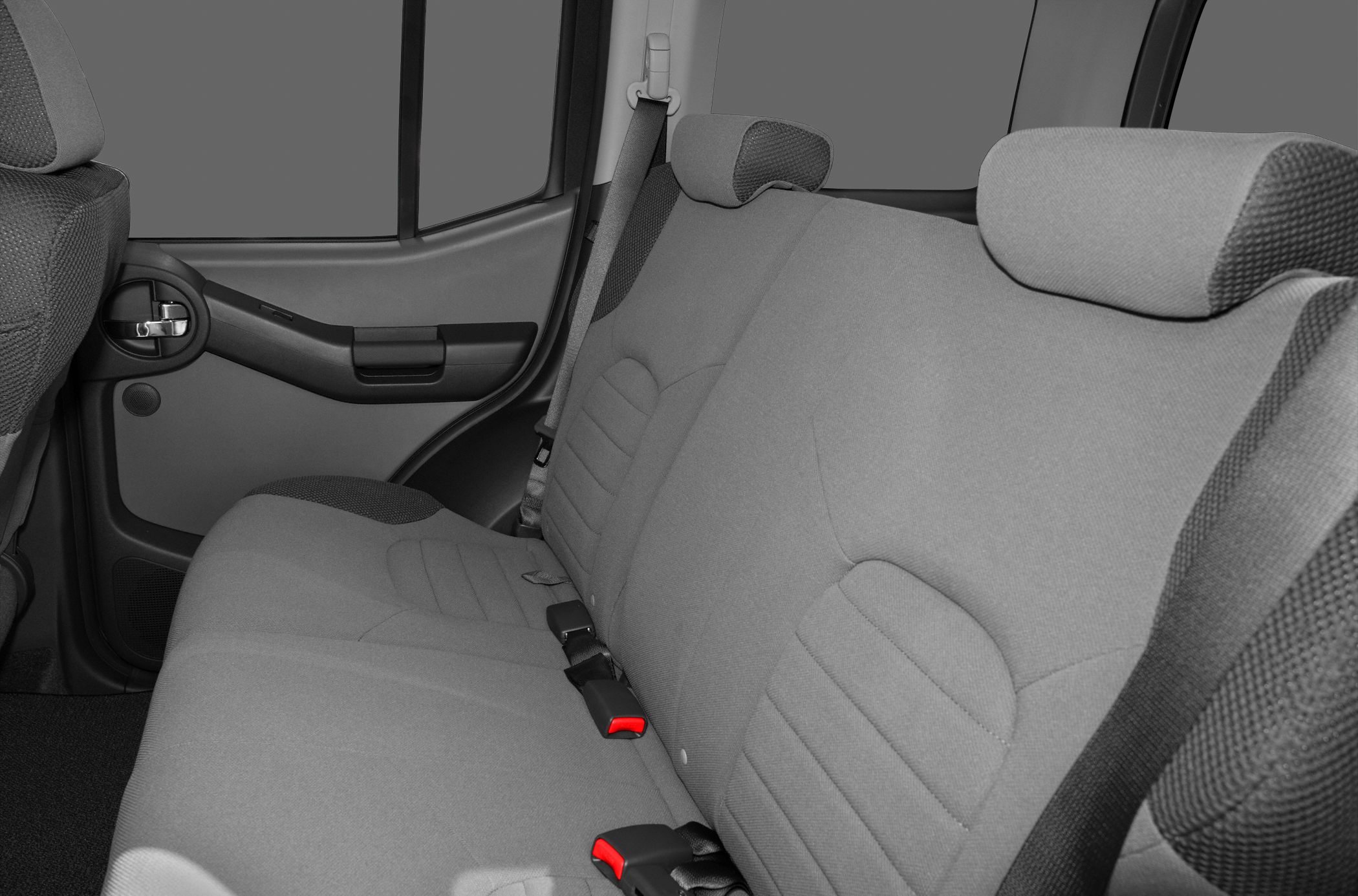 Rear passenger seat with fabric upholstery and seat belts