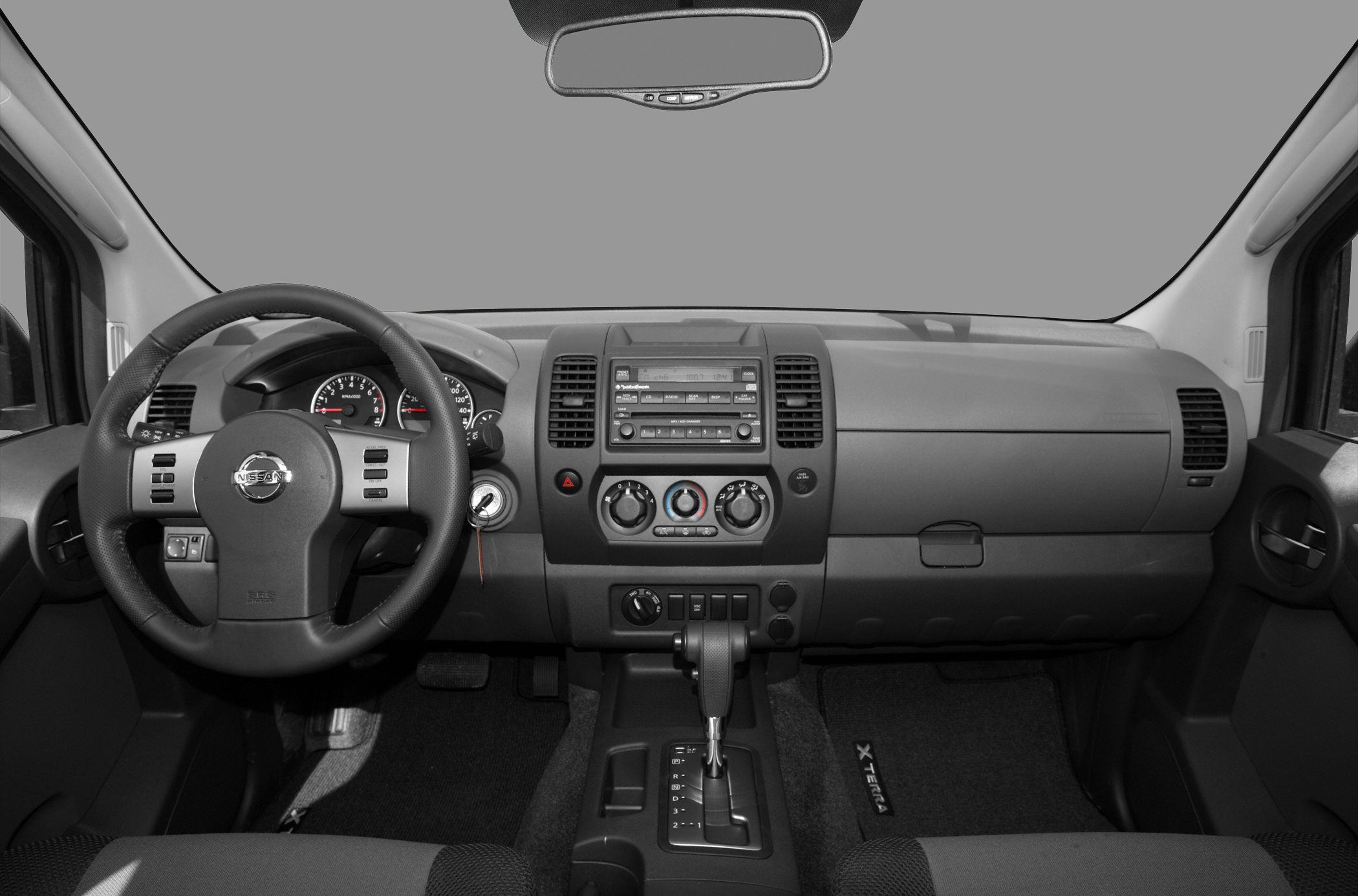 Dashboard, steering wheel, central console with radio and climate controls