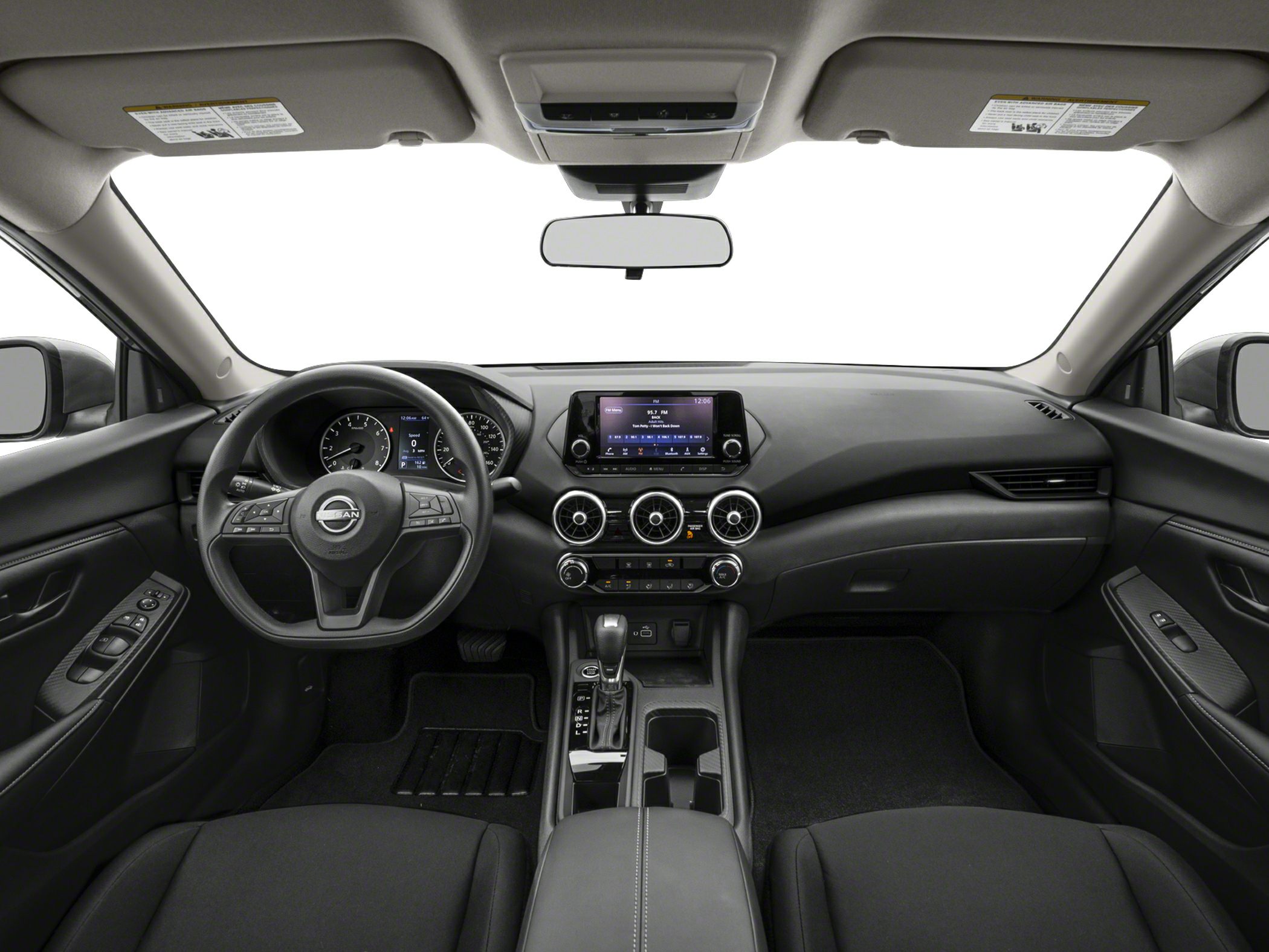 Modern dashboard with touchscreen and round air vents in car interior