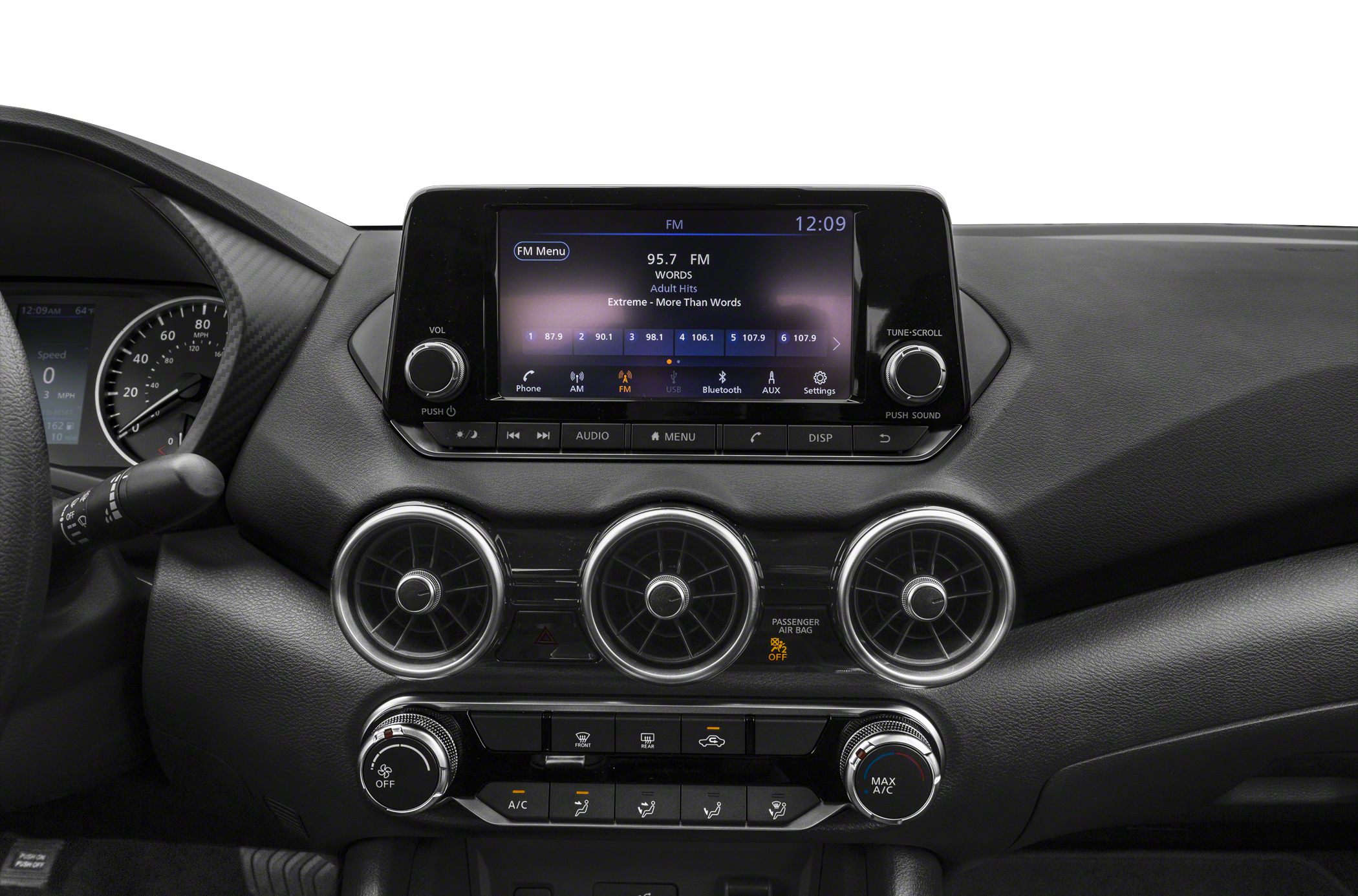 Infotainment system display and circular air vents on dashboard