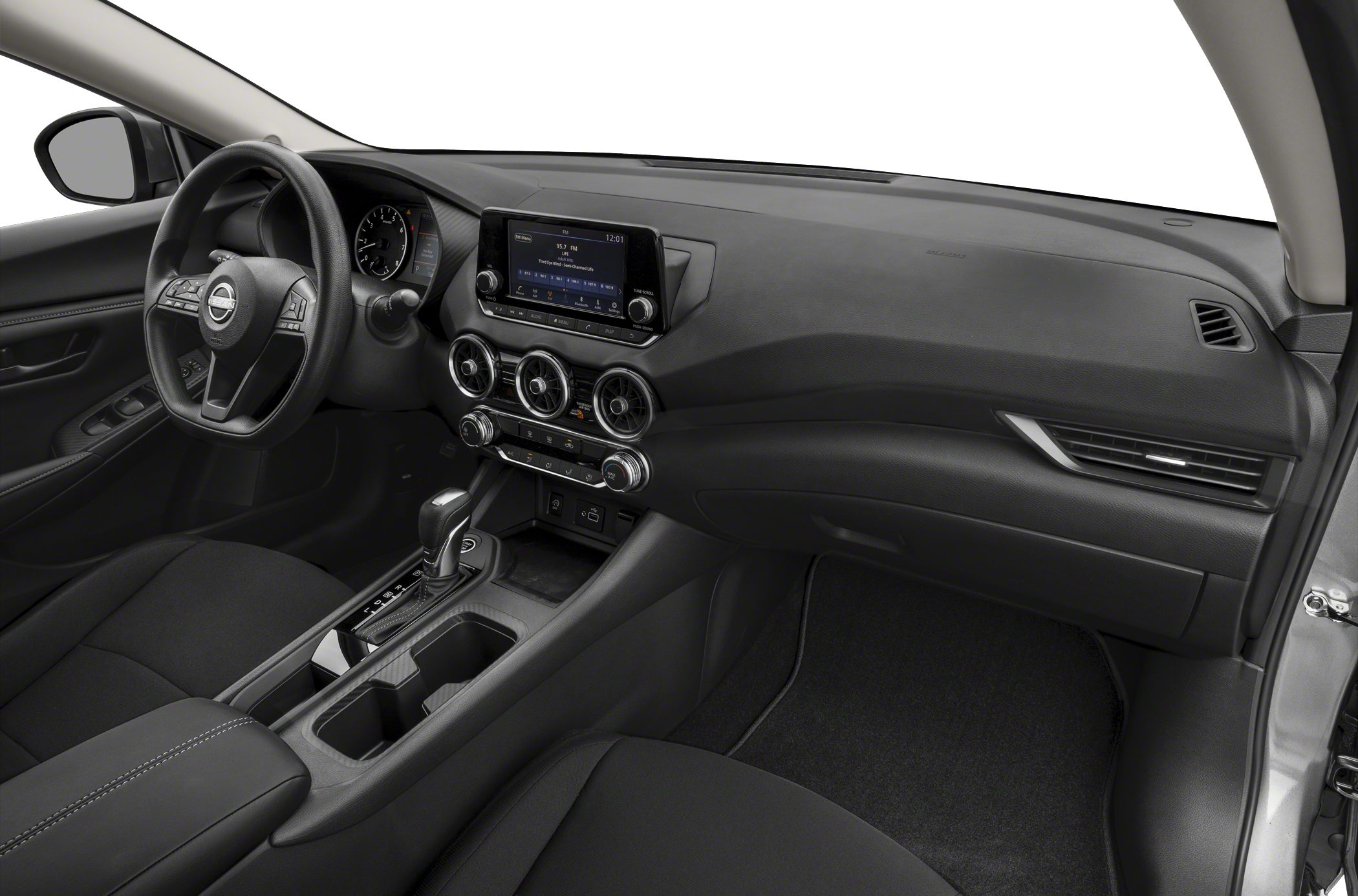 Modern dashboard and center console with circular air vents