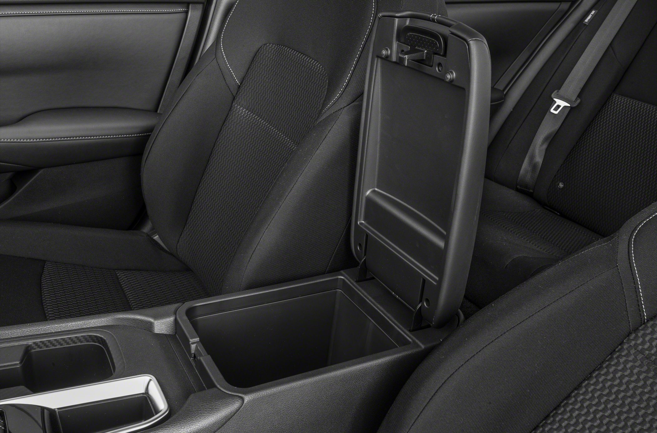Center console storage compartment and front seat upholstery with detailed stitching