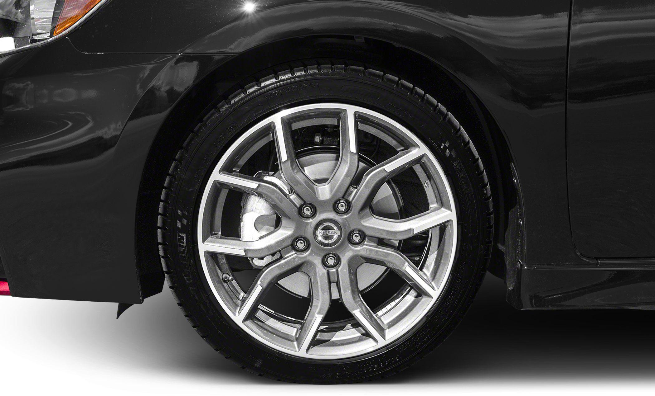 Close-up of Nissan Sentra alloy wheel and brake disc