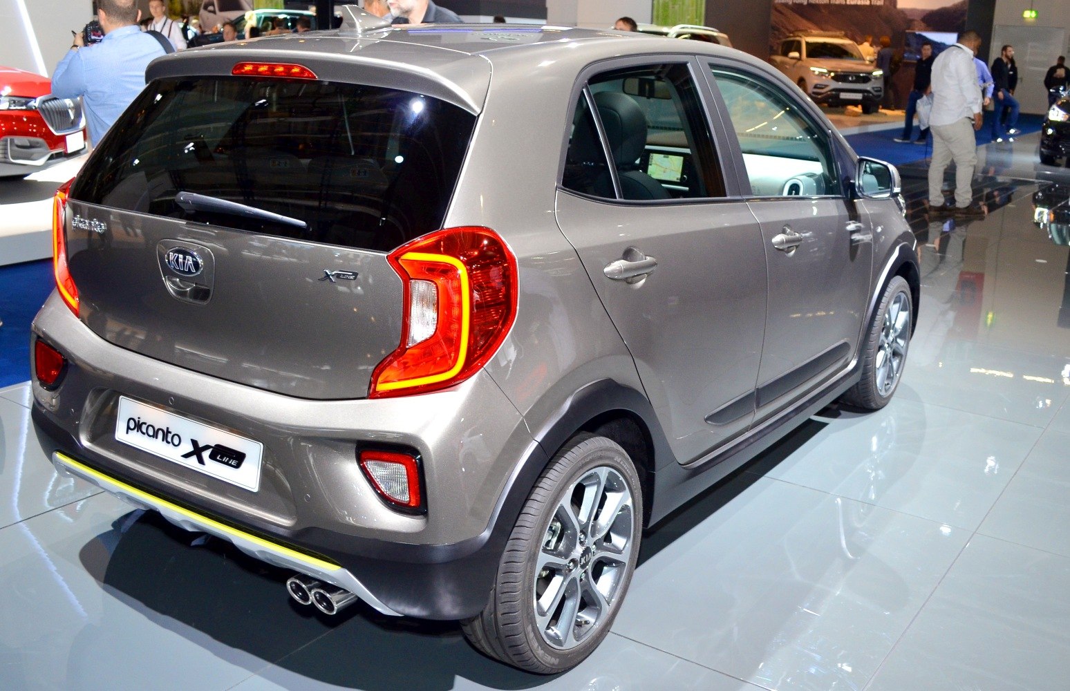 Hatchback rear view with distinct tail lights and dual exhaust pipes