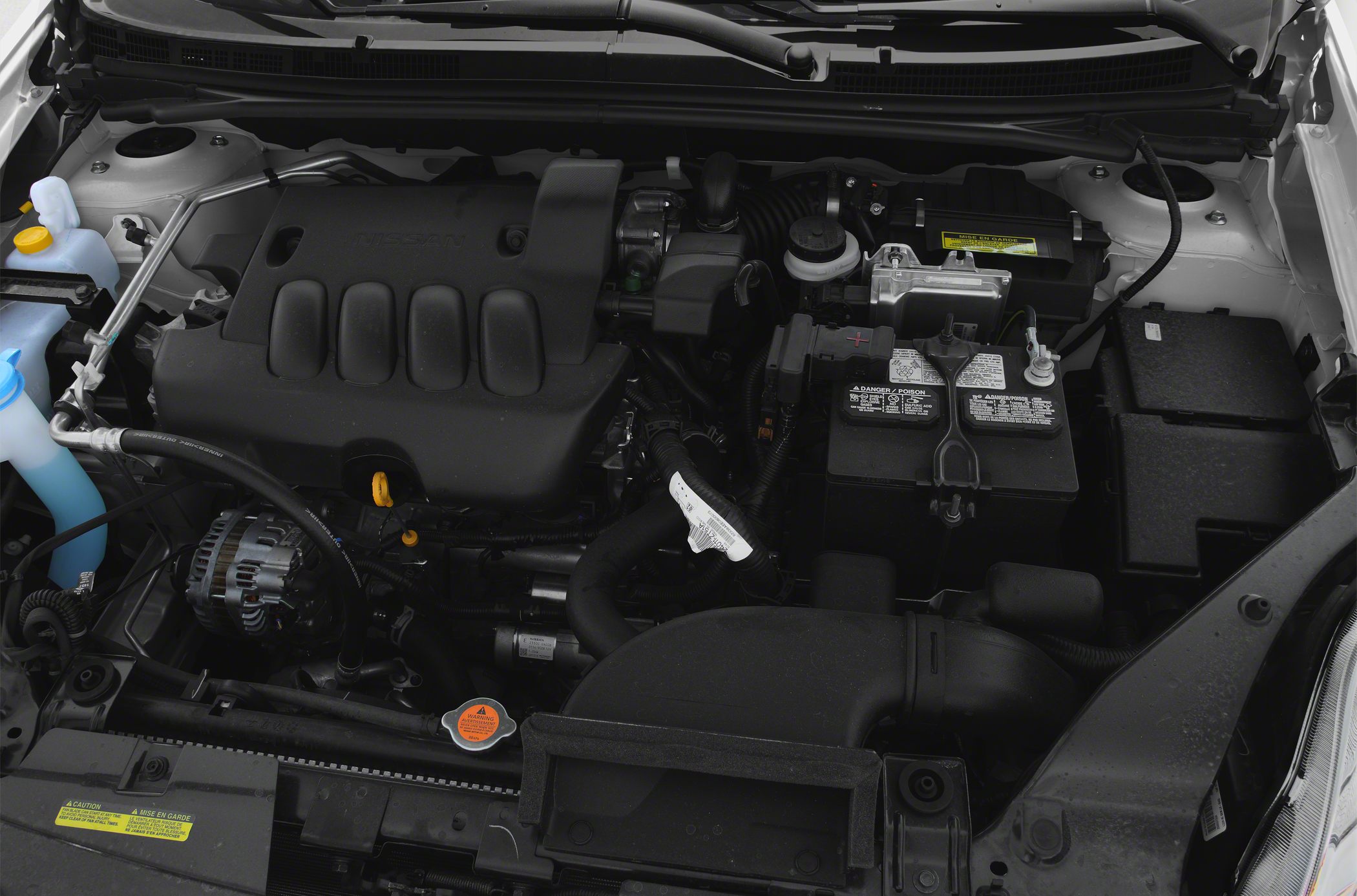 Engine bay with engine cover and battery compartment