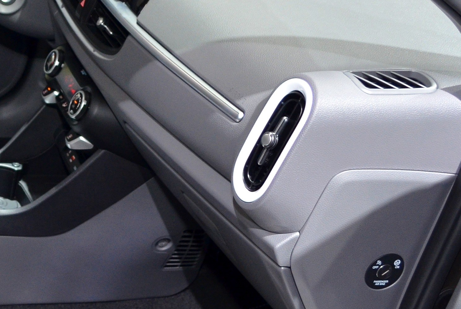 Dashboard and air vent with climate controls