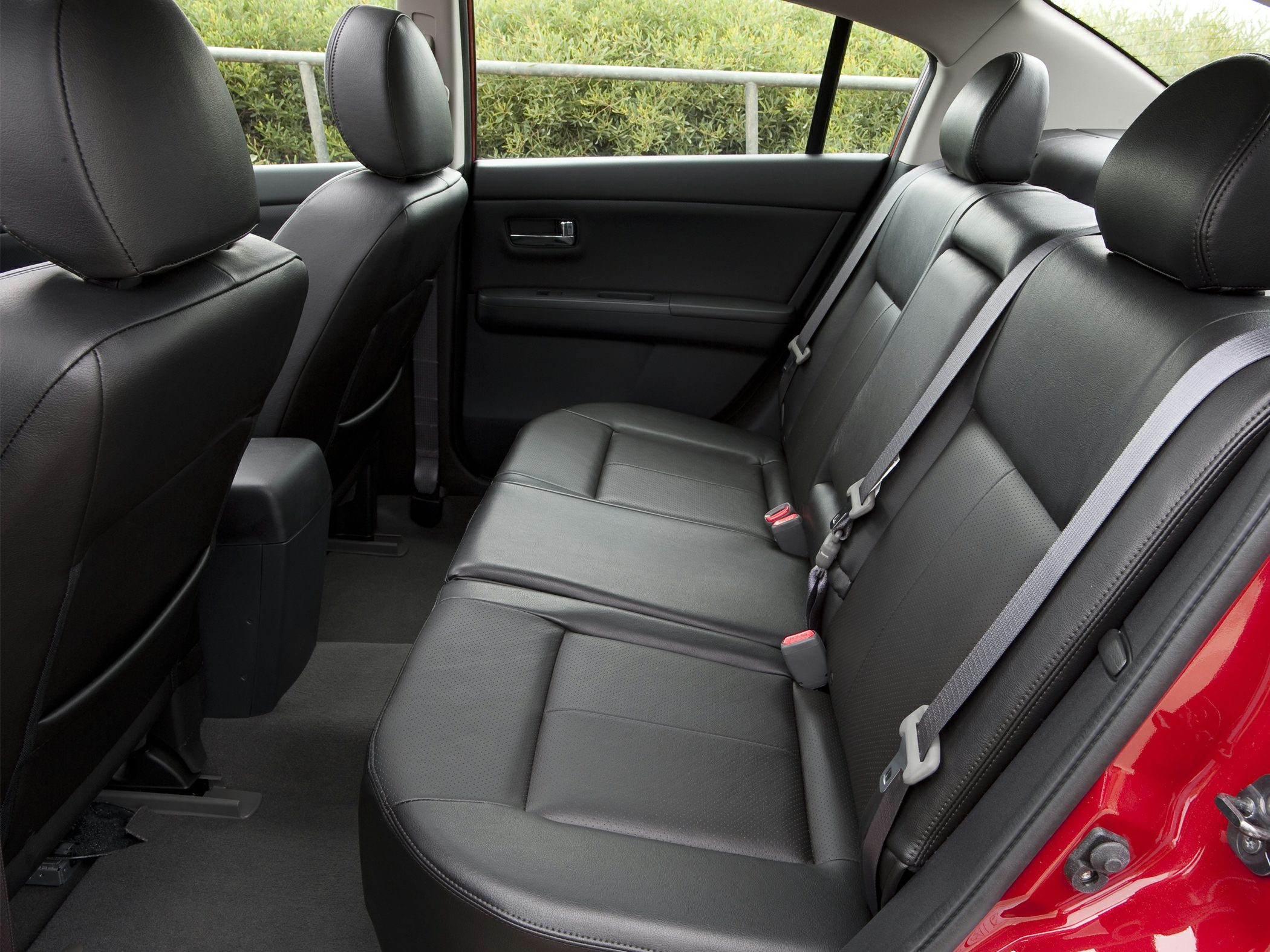 Black leather rear seats with seat belts and headrests