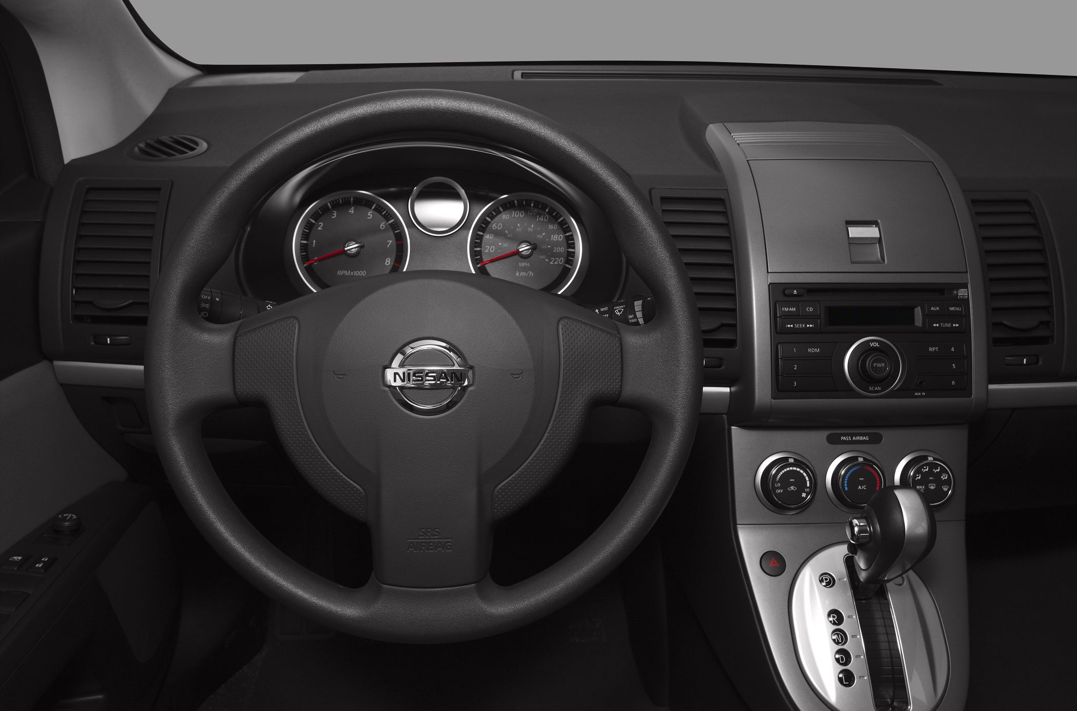 Steering wheel and dashboard with instrument cluster and center console