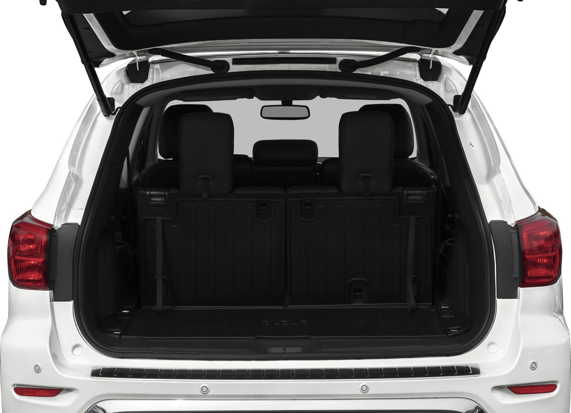Open tailgate showing rear cargo and third-row seat backs
