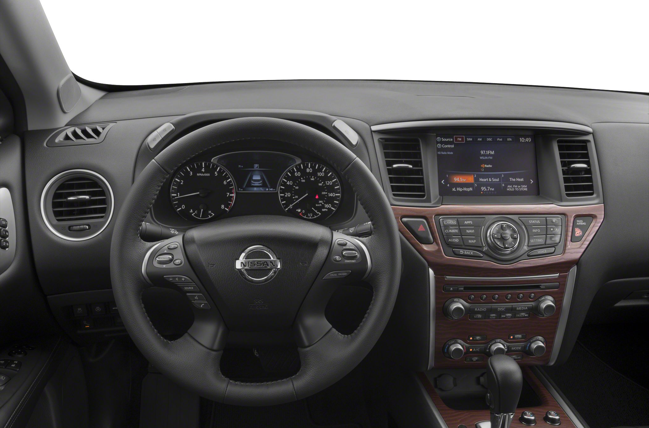 Steering wheel and dashboard with wood grain trim and infotainment screen