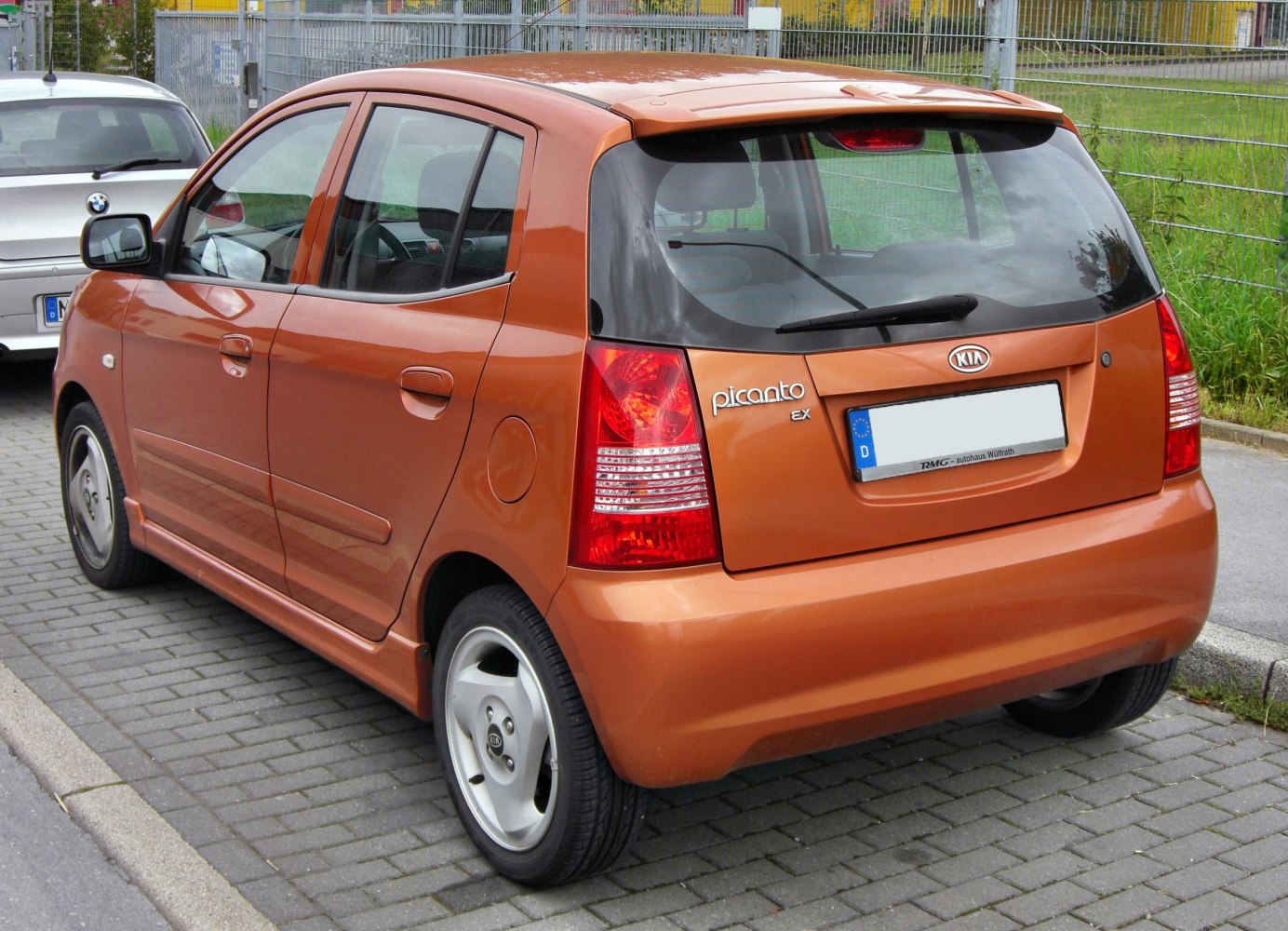 Rear and side view of a compact five-door hatchback with distinctive taillights.
