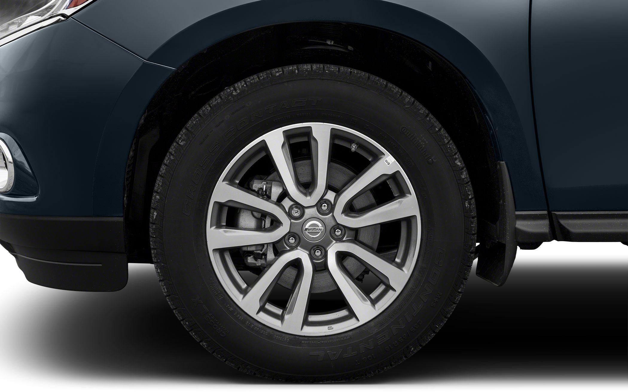 Alloy wheel and tire close-up with detailed rim design