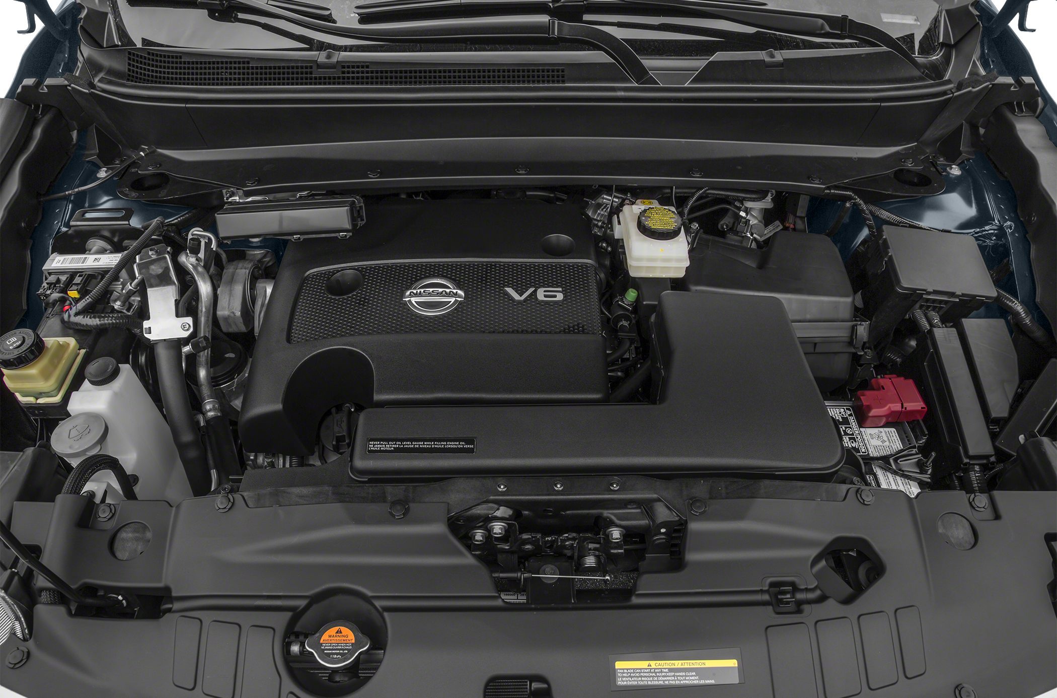 V6 engine bay with Nissan branding and surrounding engine components