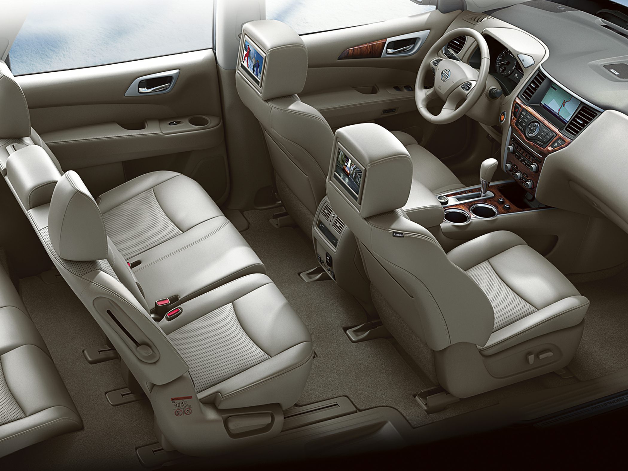 Spacious SUV cabin with beige leather seats and rear entertainment screens
