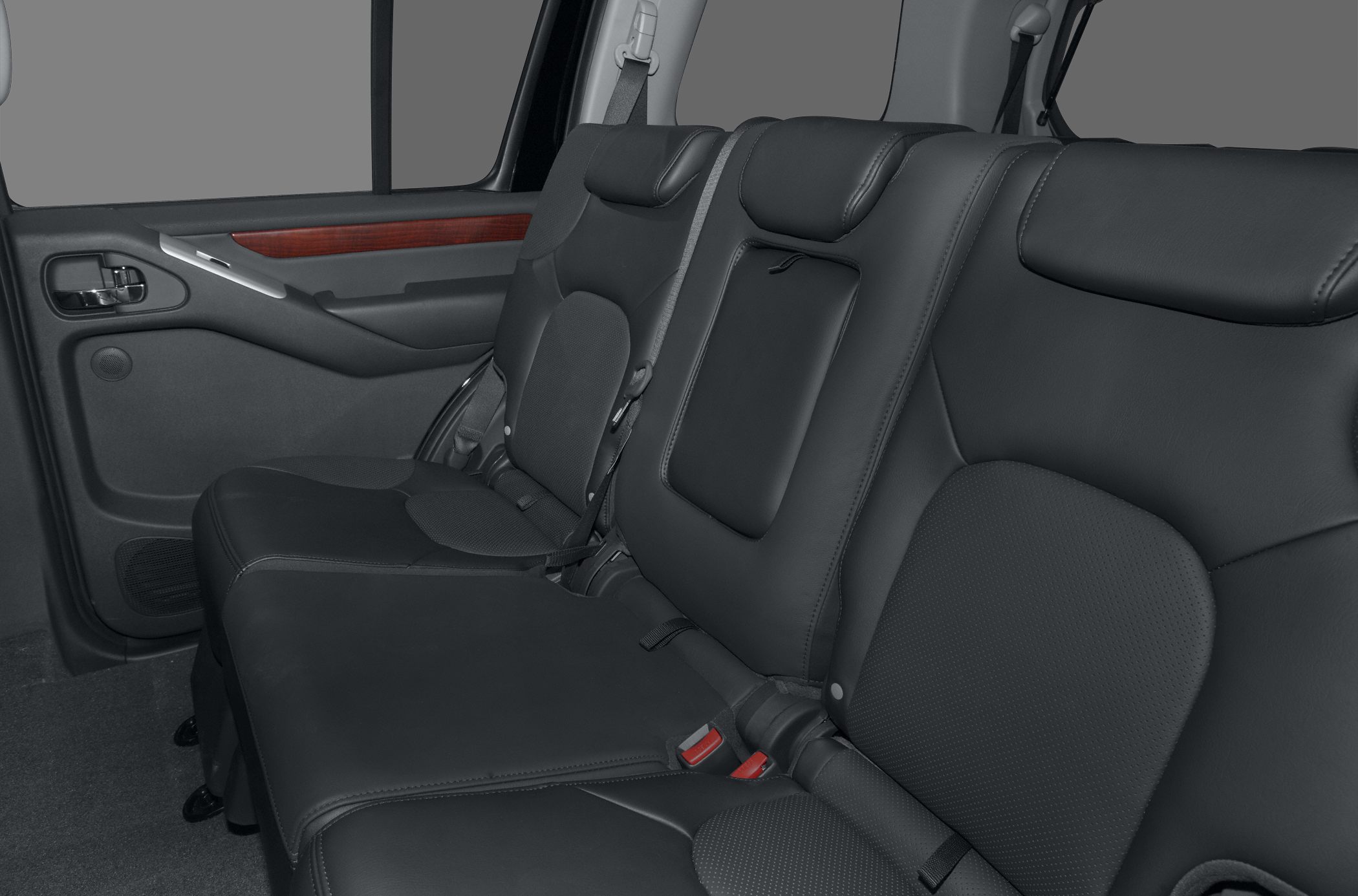 Leather rear seat interior with armrest and seat belts