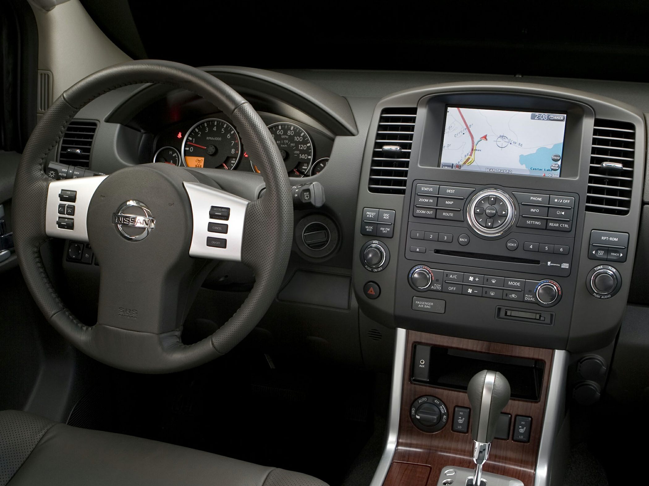 Steering wheel, dashboard with navigation system and control buttons